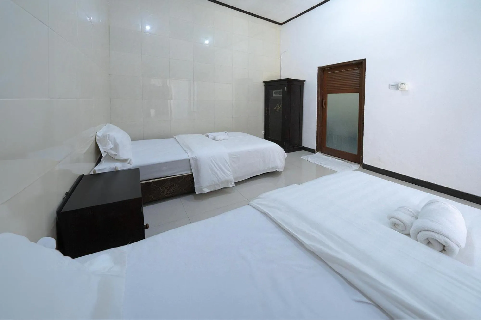 Bed in Dive & Dwell Tulamben