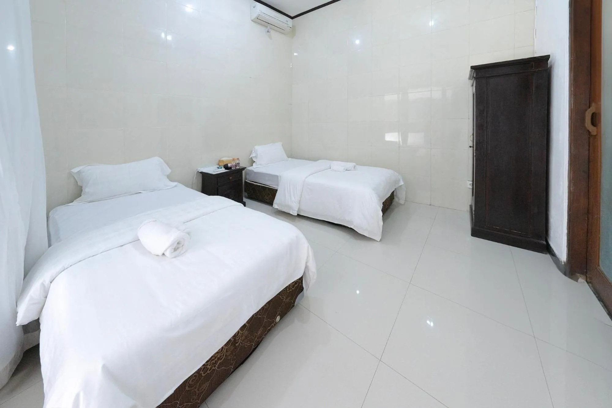 Bed in Dive & Dwell Tulamben