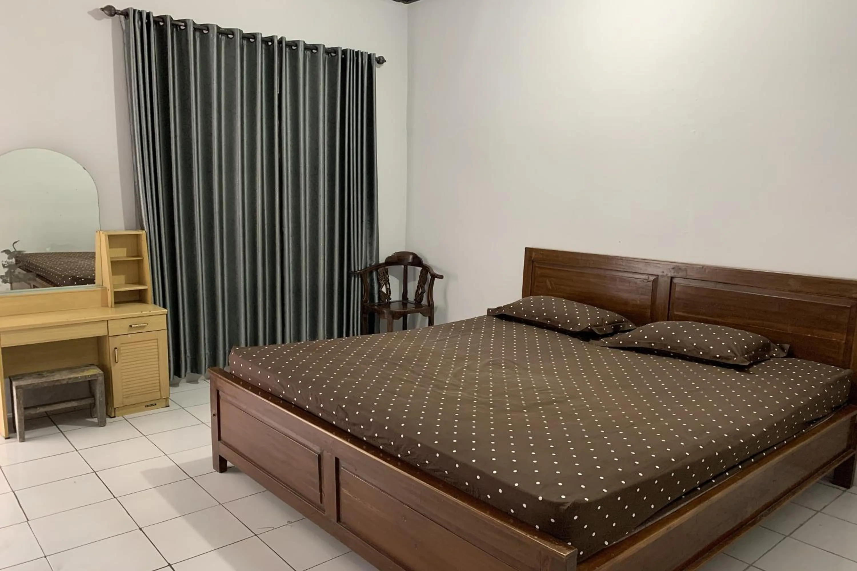 Bed in Hotel Merak Indah