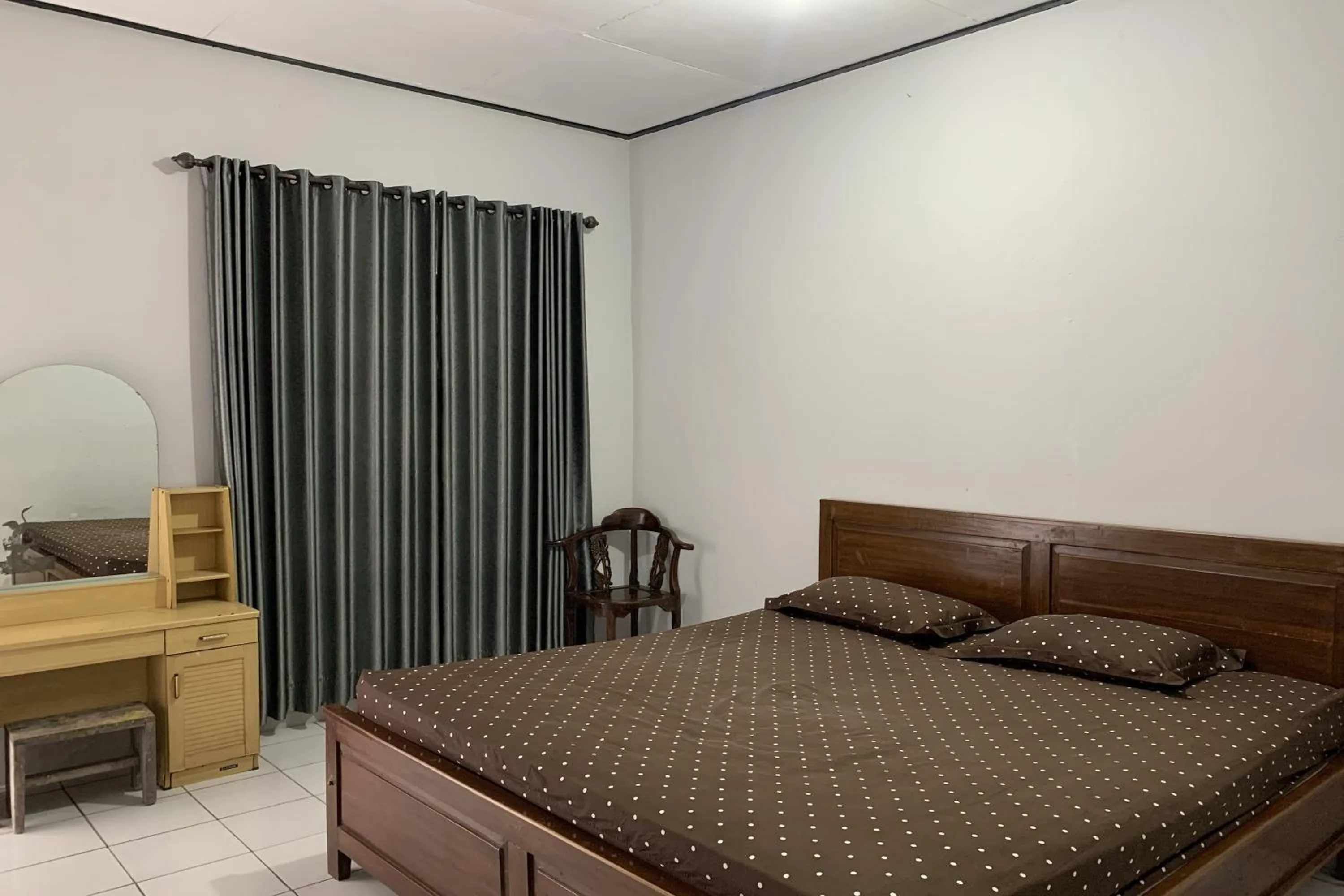 Bed in Hotel Merak Indah