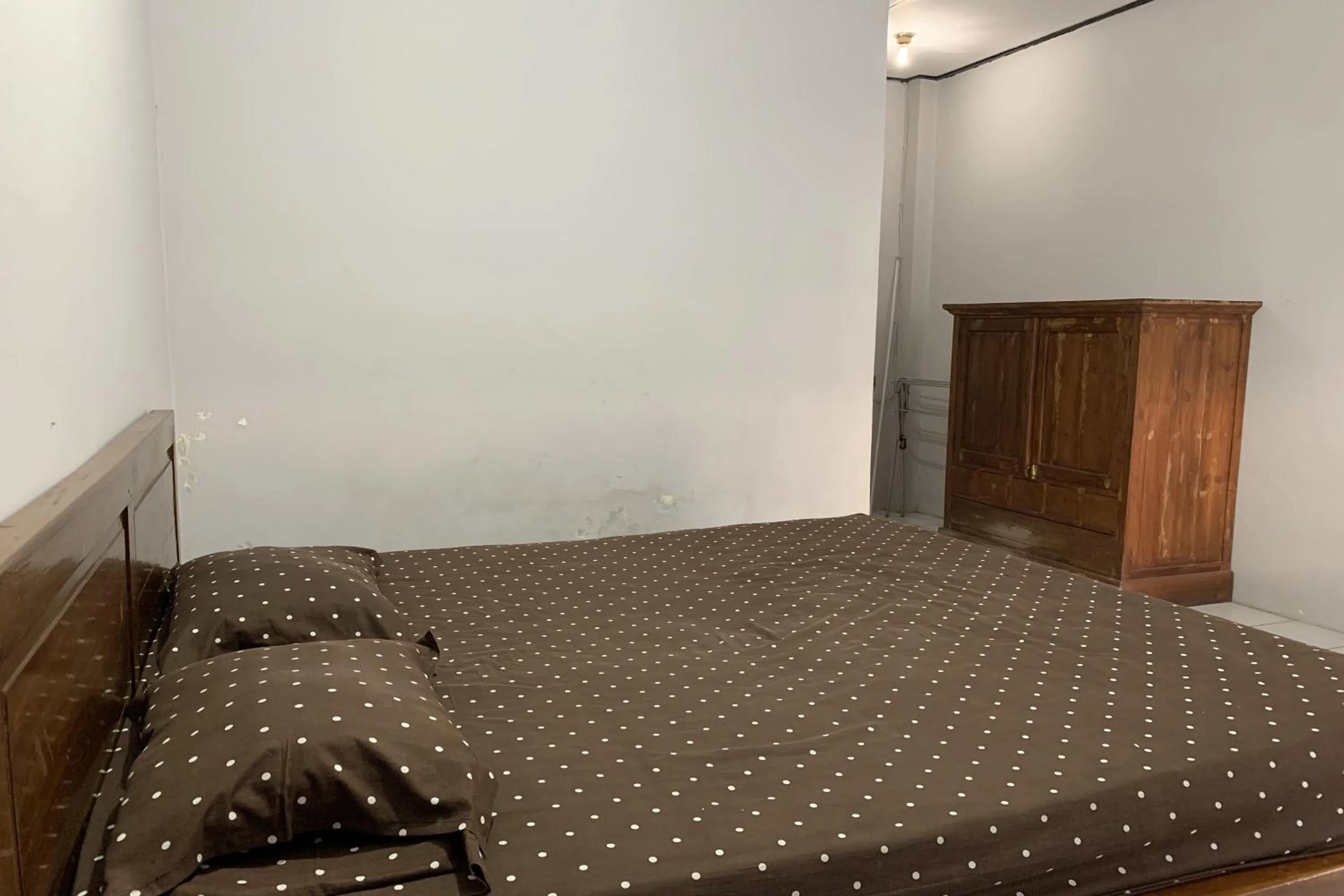 Bed in Hotel Merak Indah