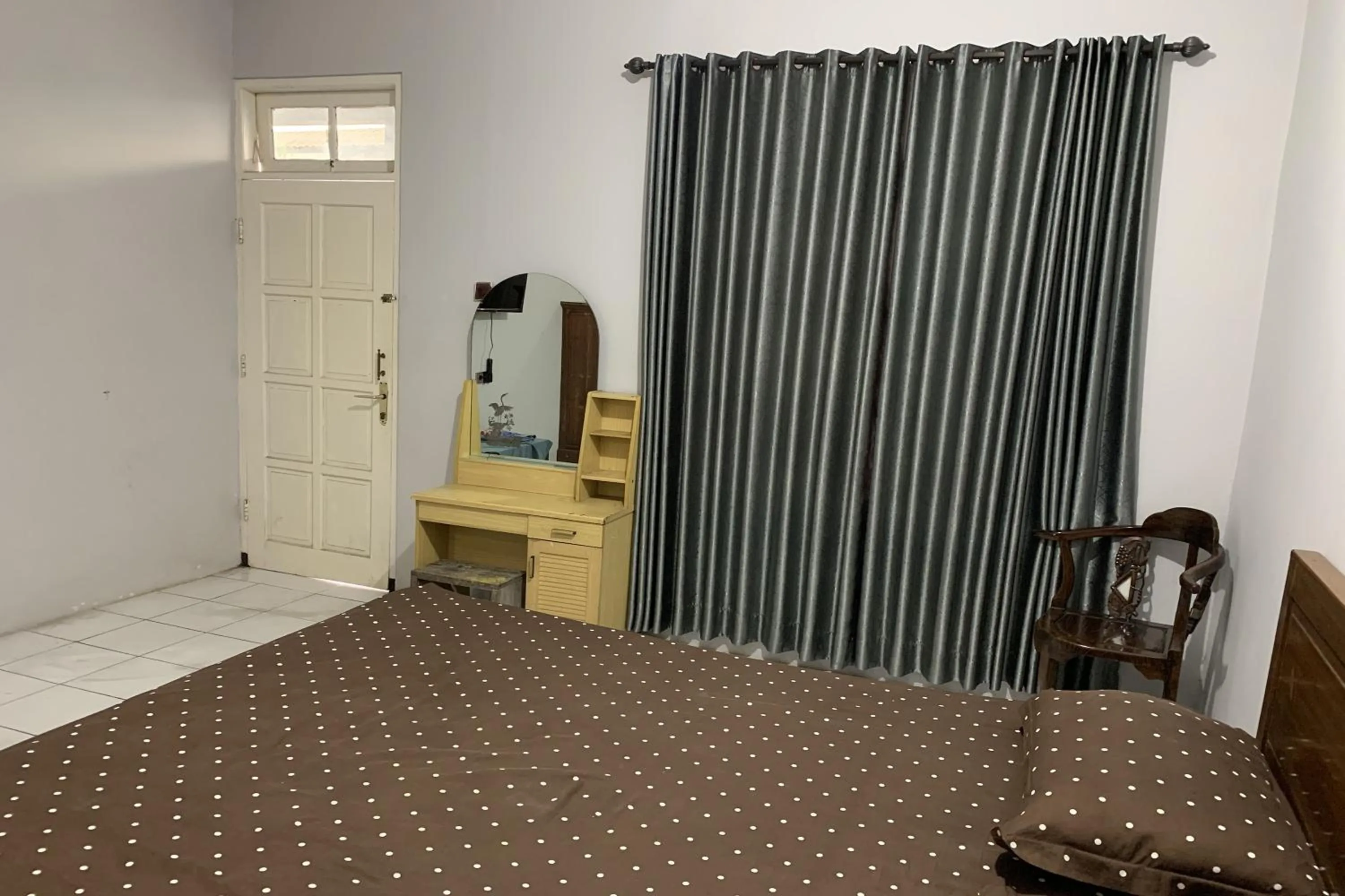 Bed in Hotel Merak Indah