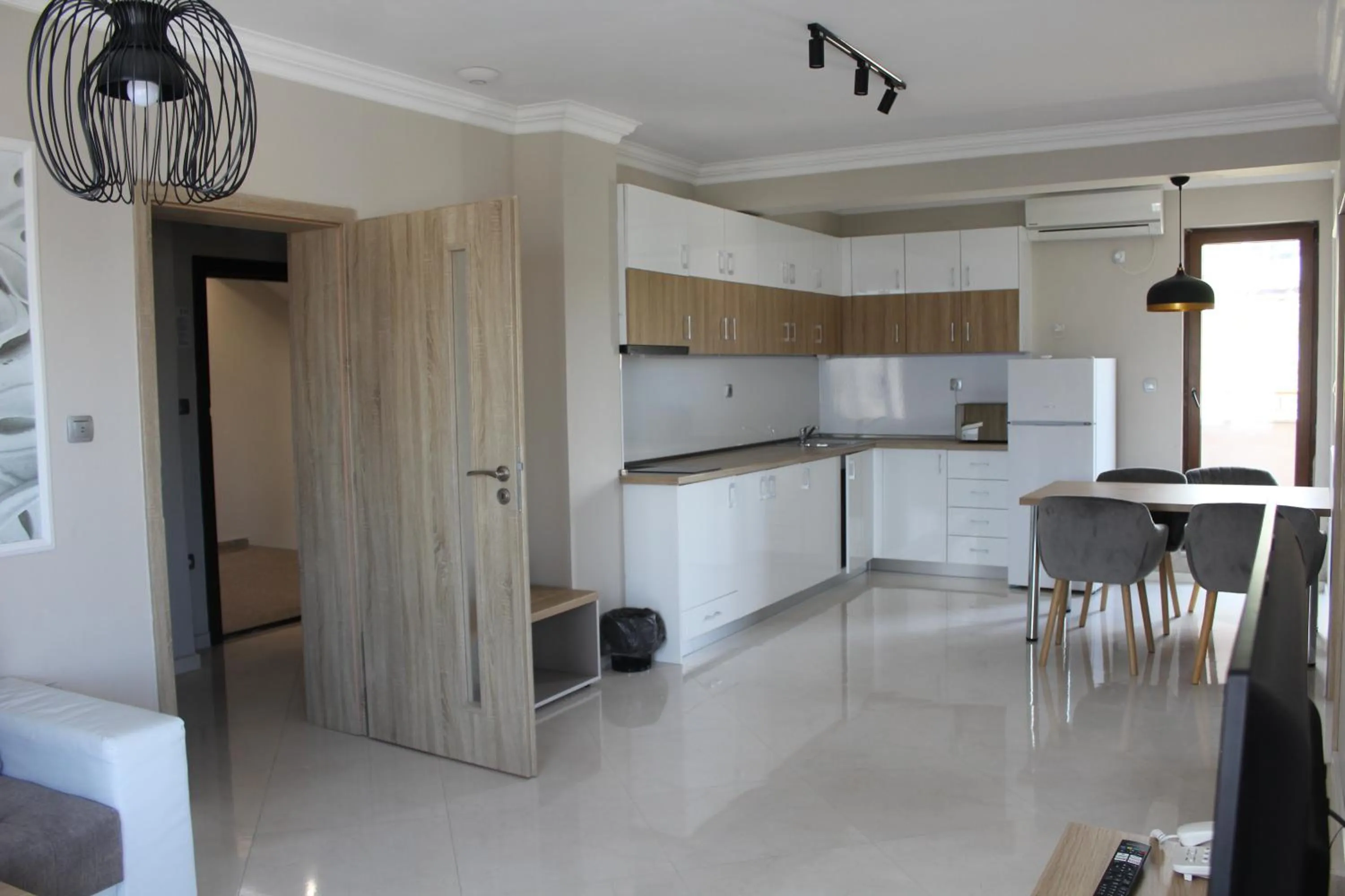 Kitchen or kitchenette in Vemara City Boutique Hotel-free parking