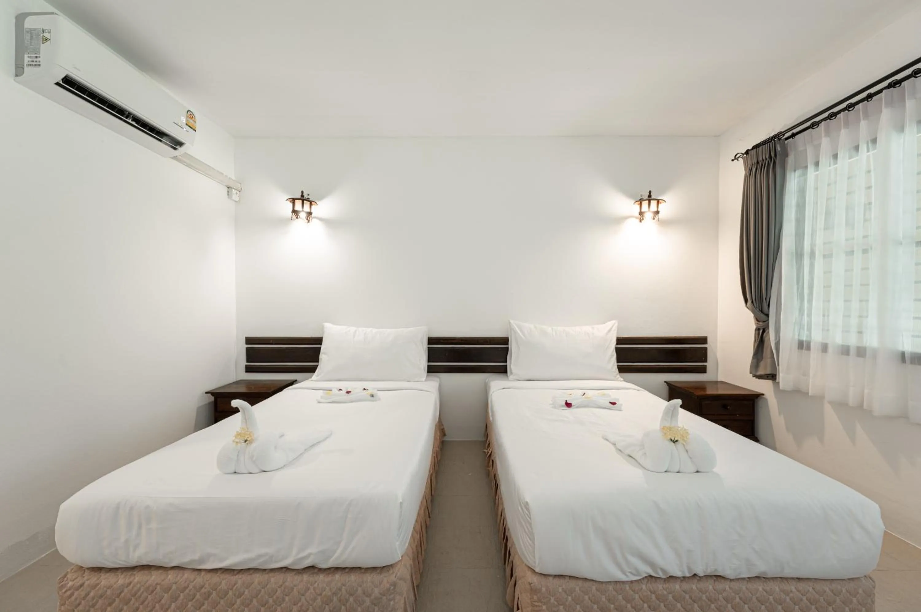 Bed in Ban Raya Resort and Spa