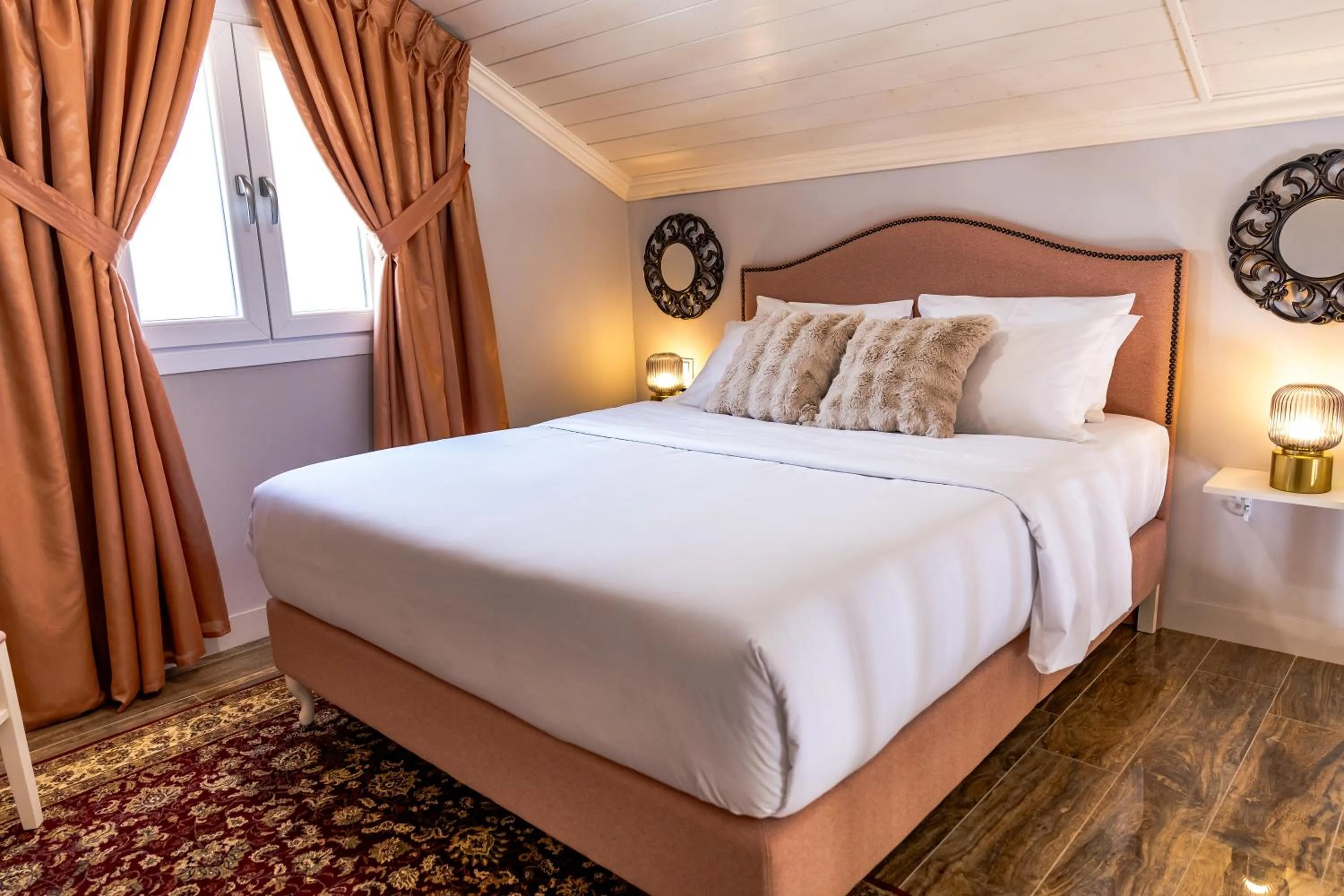 Bed in Nafsika Suites