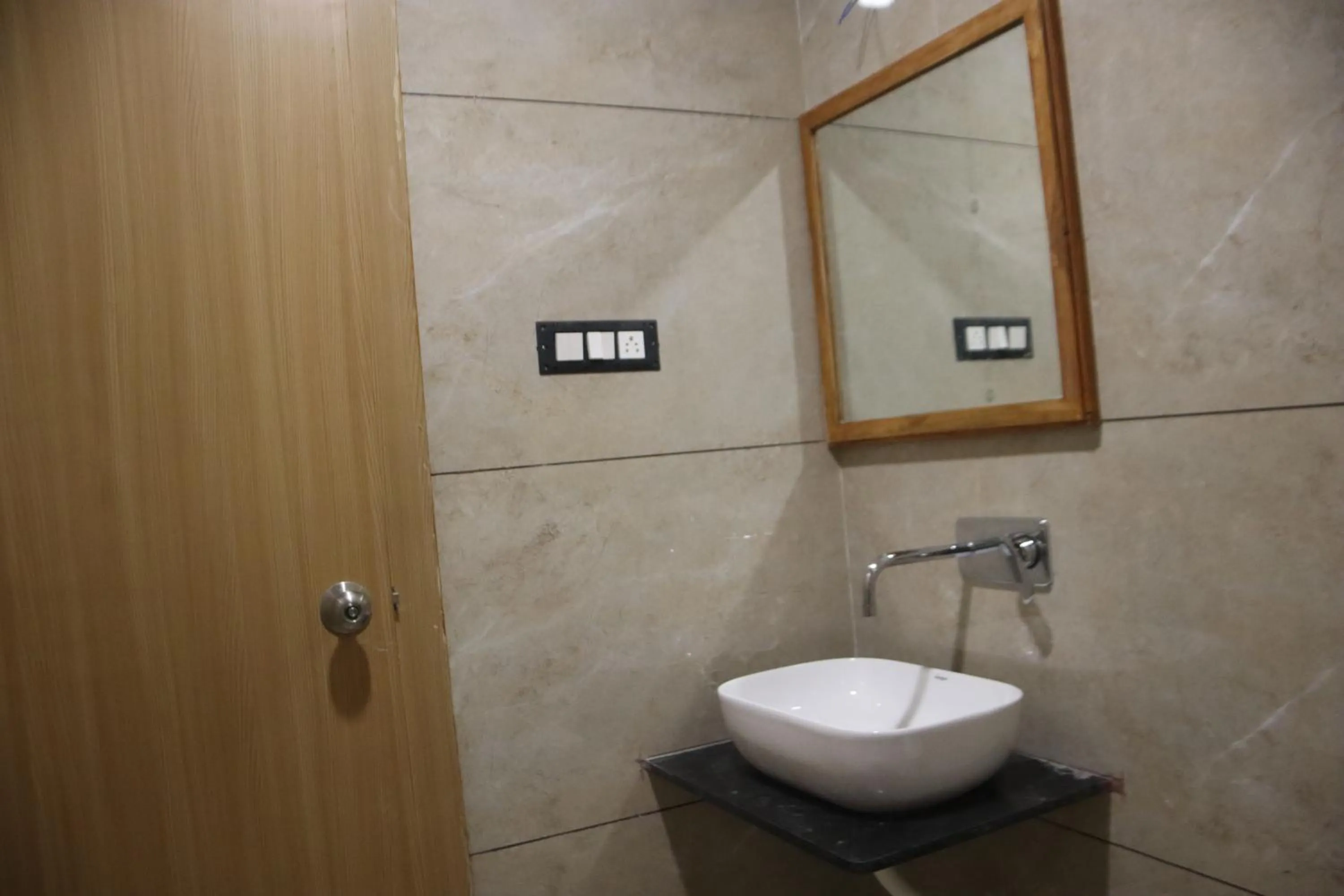 Bathroom in The Sky Comfort Beach Hotel, Dwarka