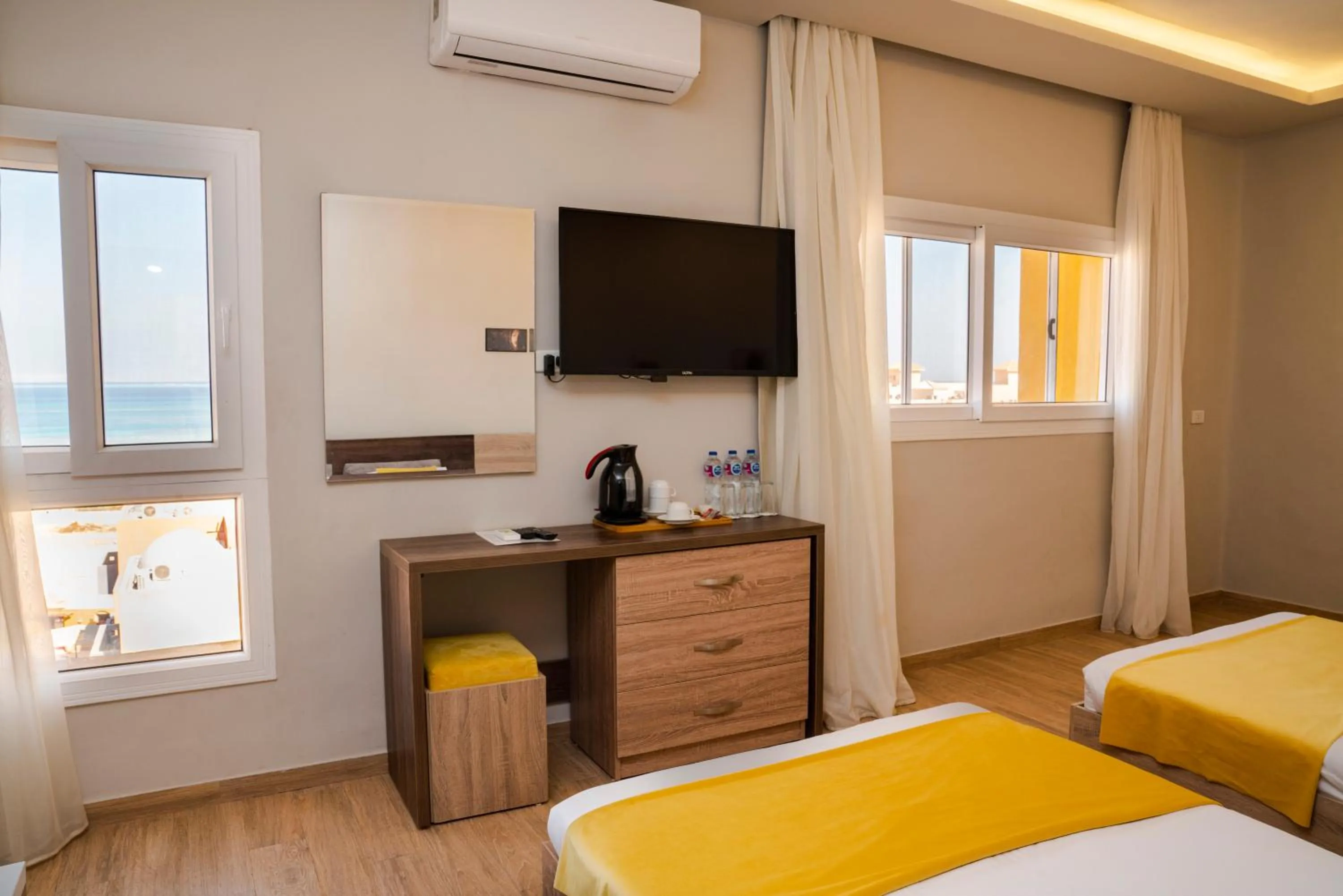 Communal lounge/ TV room, Bed in Al Dora Residence Suites Hurghada