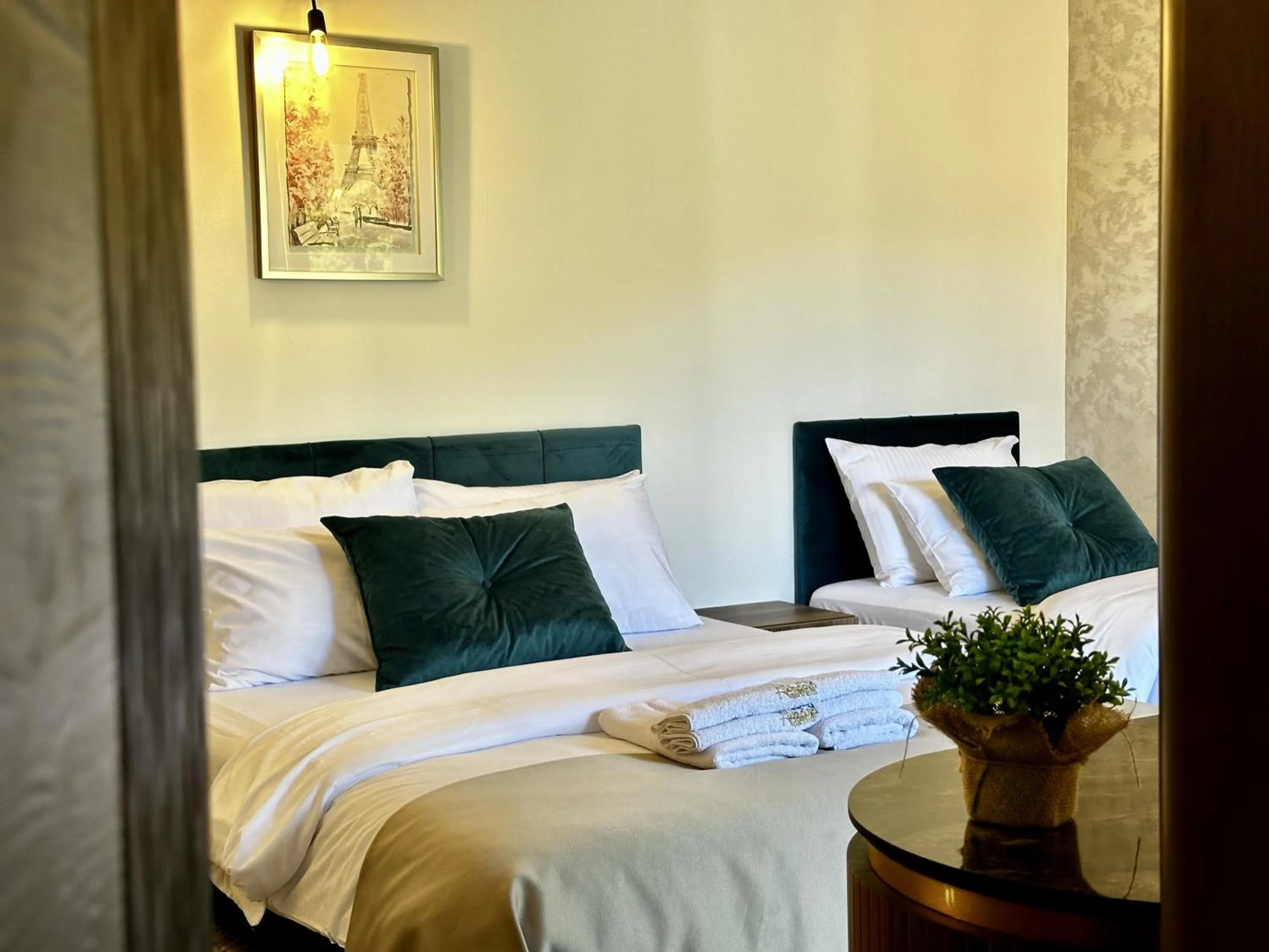 Bed in Akhdar Apartments