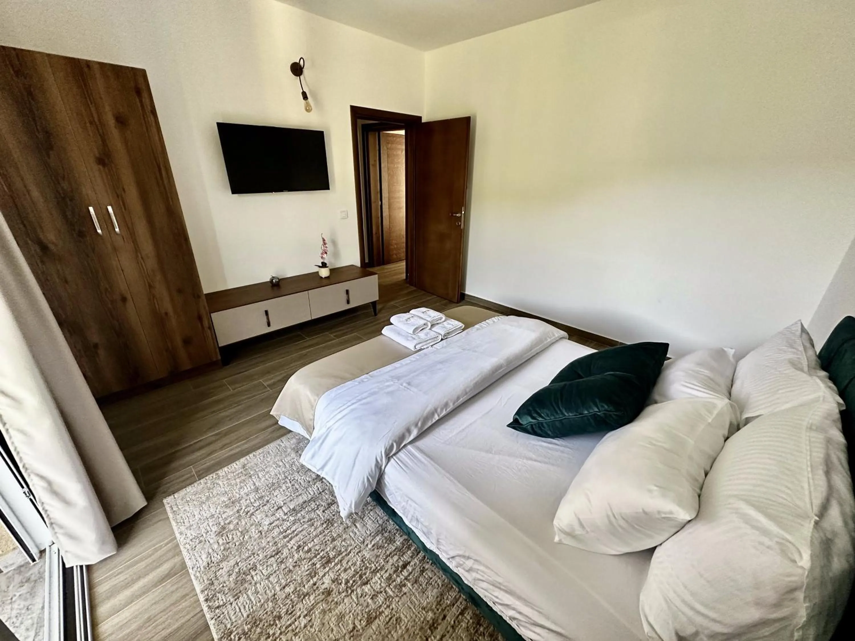 Bed in Akhdar Apartments