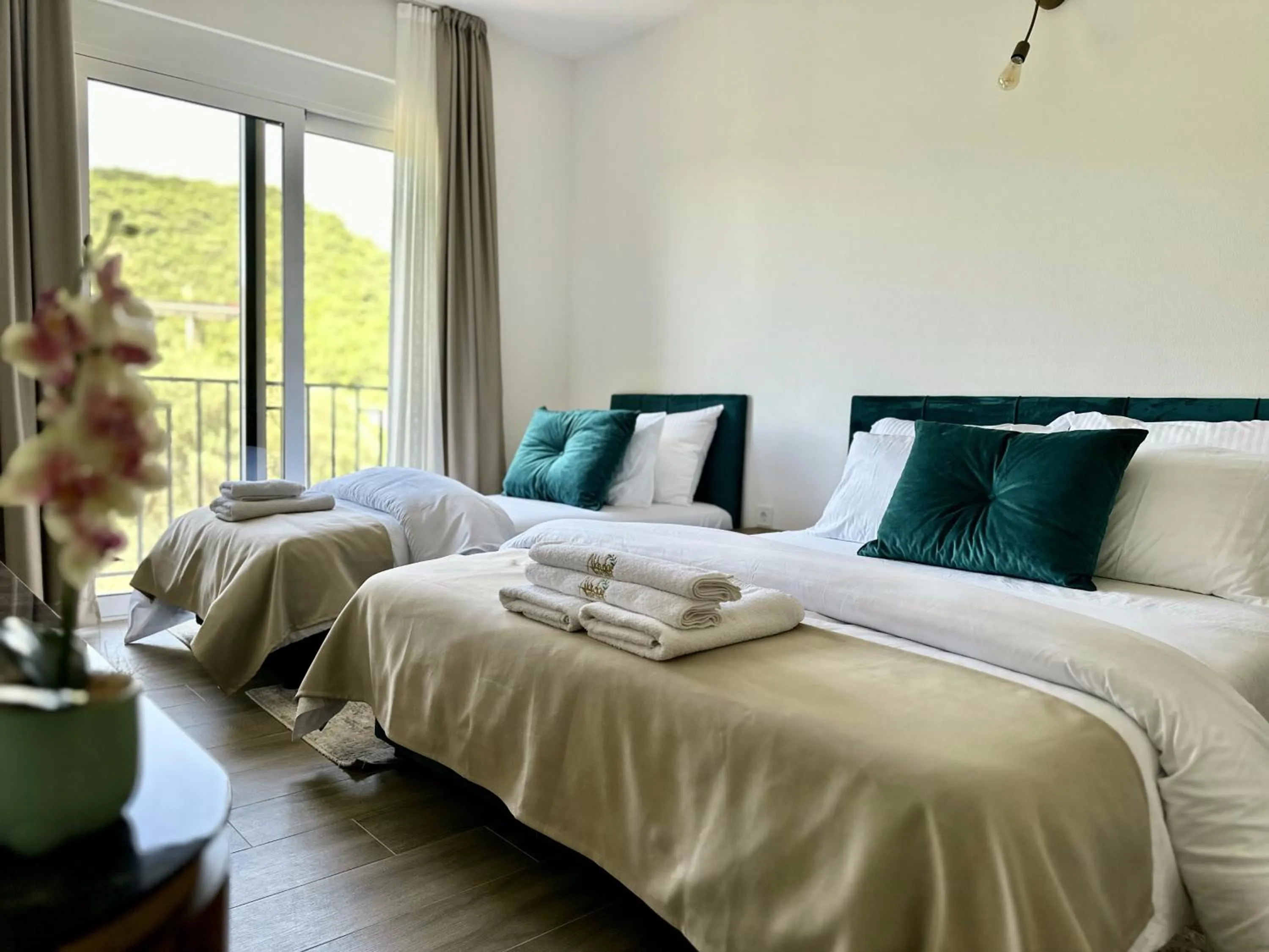 Bed in Akhdar Apartments