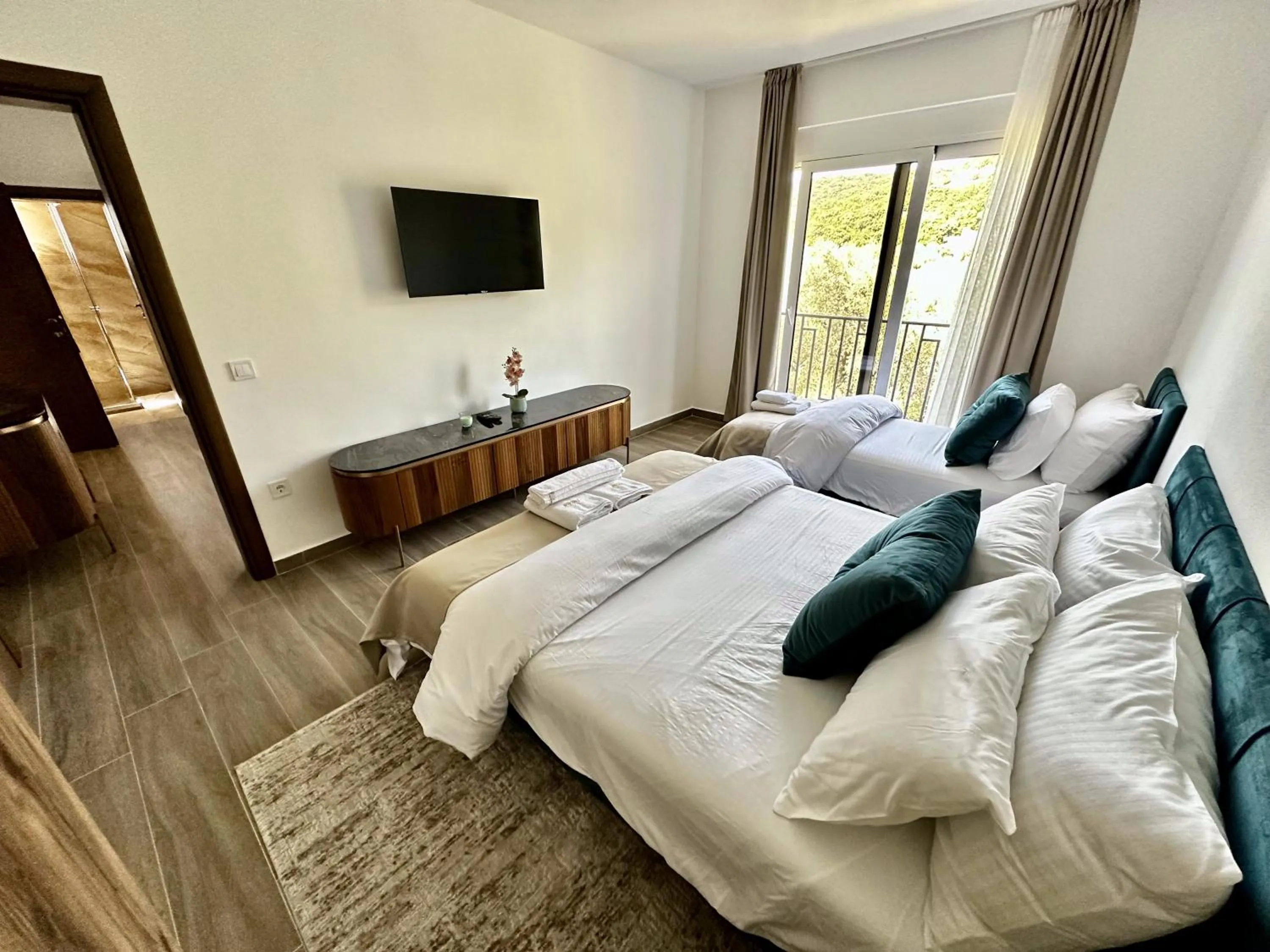 Bed in Akhdar Apartments