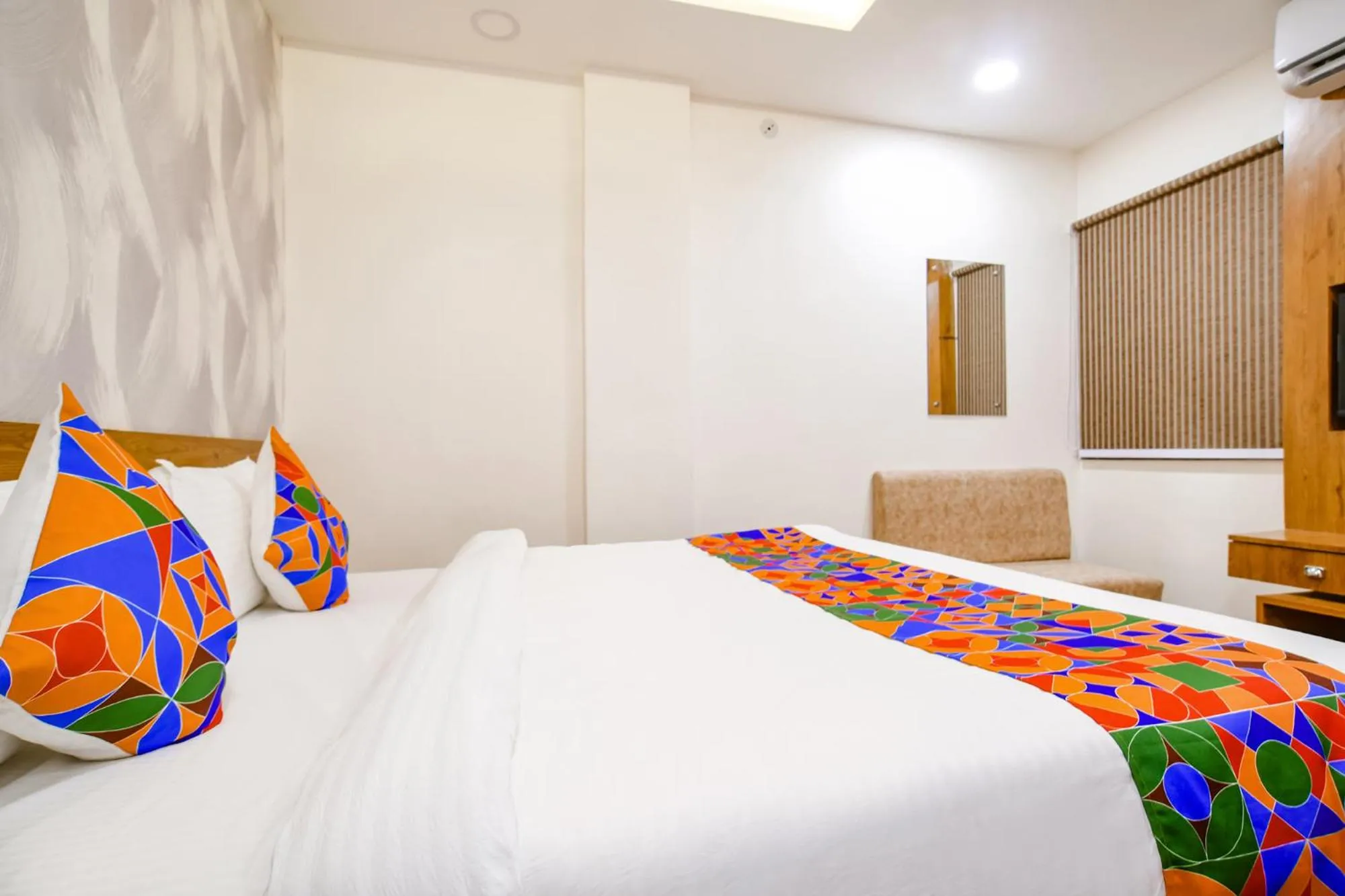 Bed in FabHotel Woodlark Inn