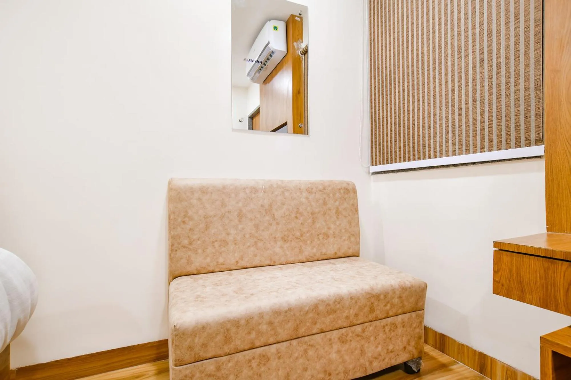 Seating area in FabHotel Woodlark Inn