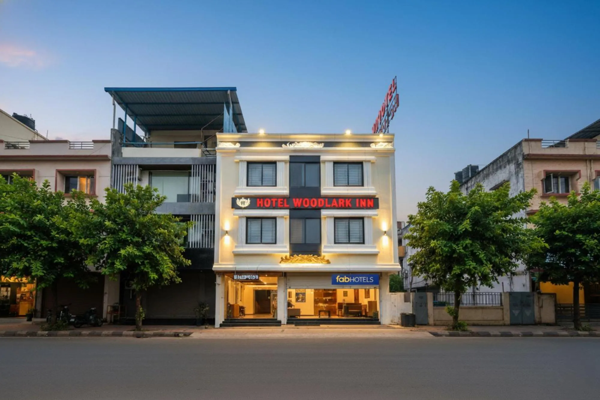 Property building in FabHotel Woodlark Inn