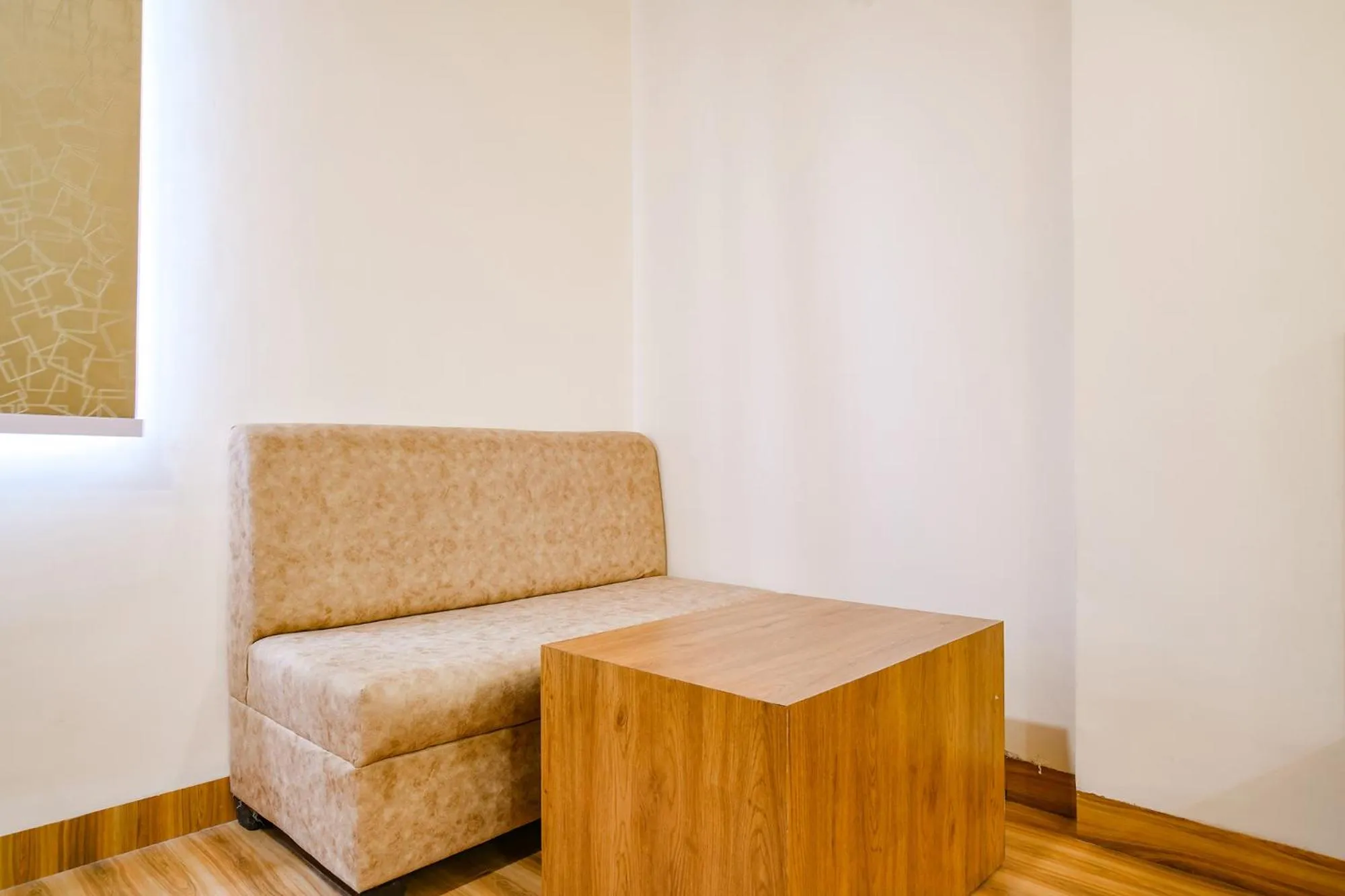 Seating area in FabHotel Woodlark Inn