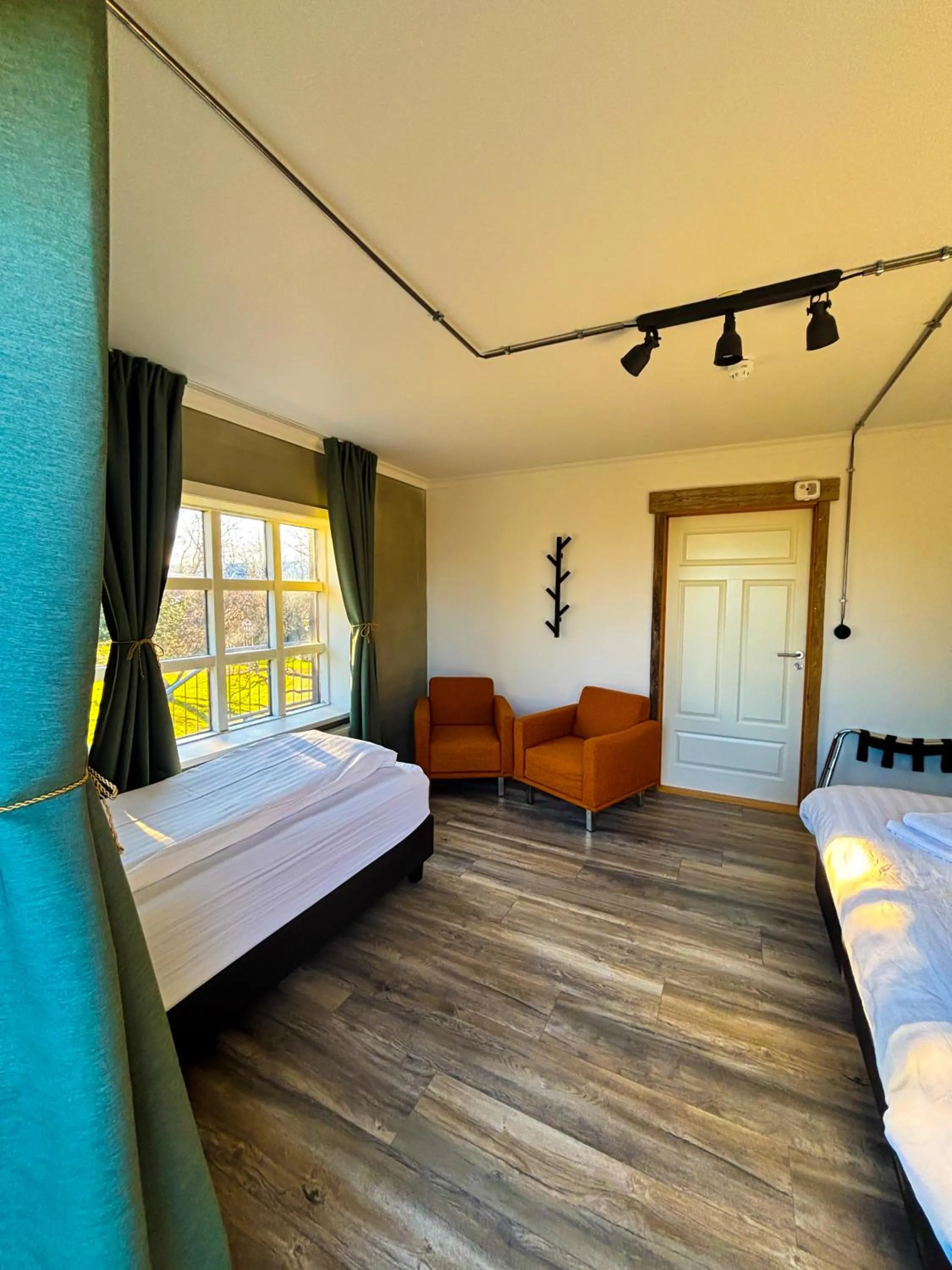 Seating area, Bed in Hotel Brú countryside