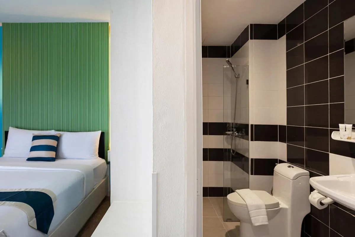 Photo of the whole room, Bed in iCheck inn Chill Patong