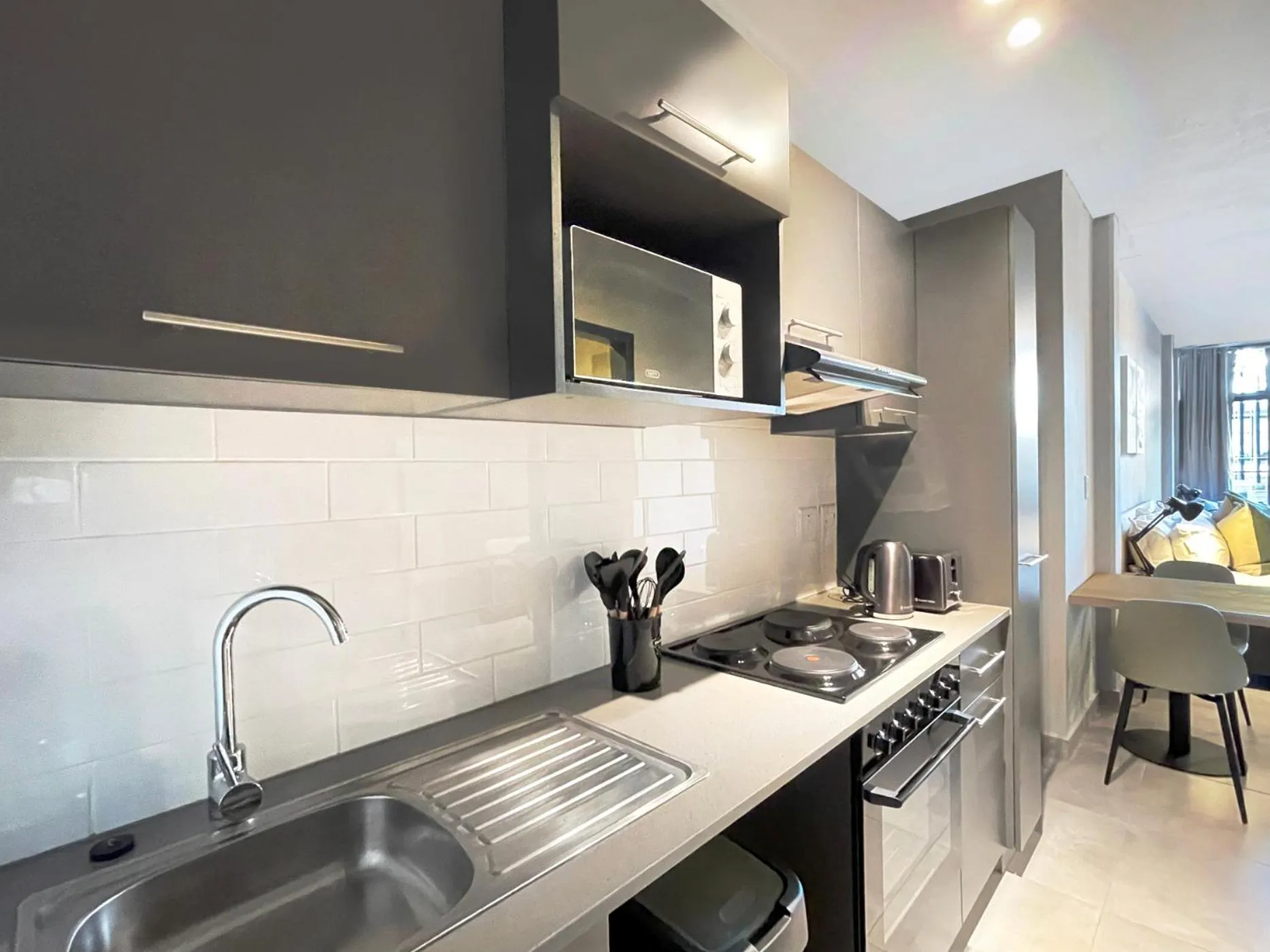 Kitchen or kitchenette in Circa Aparthotel by Totalstay