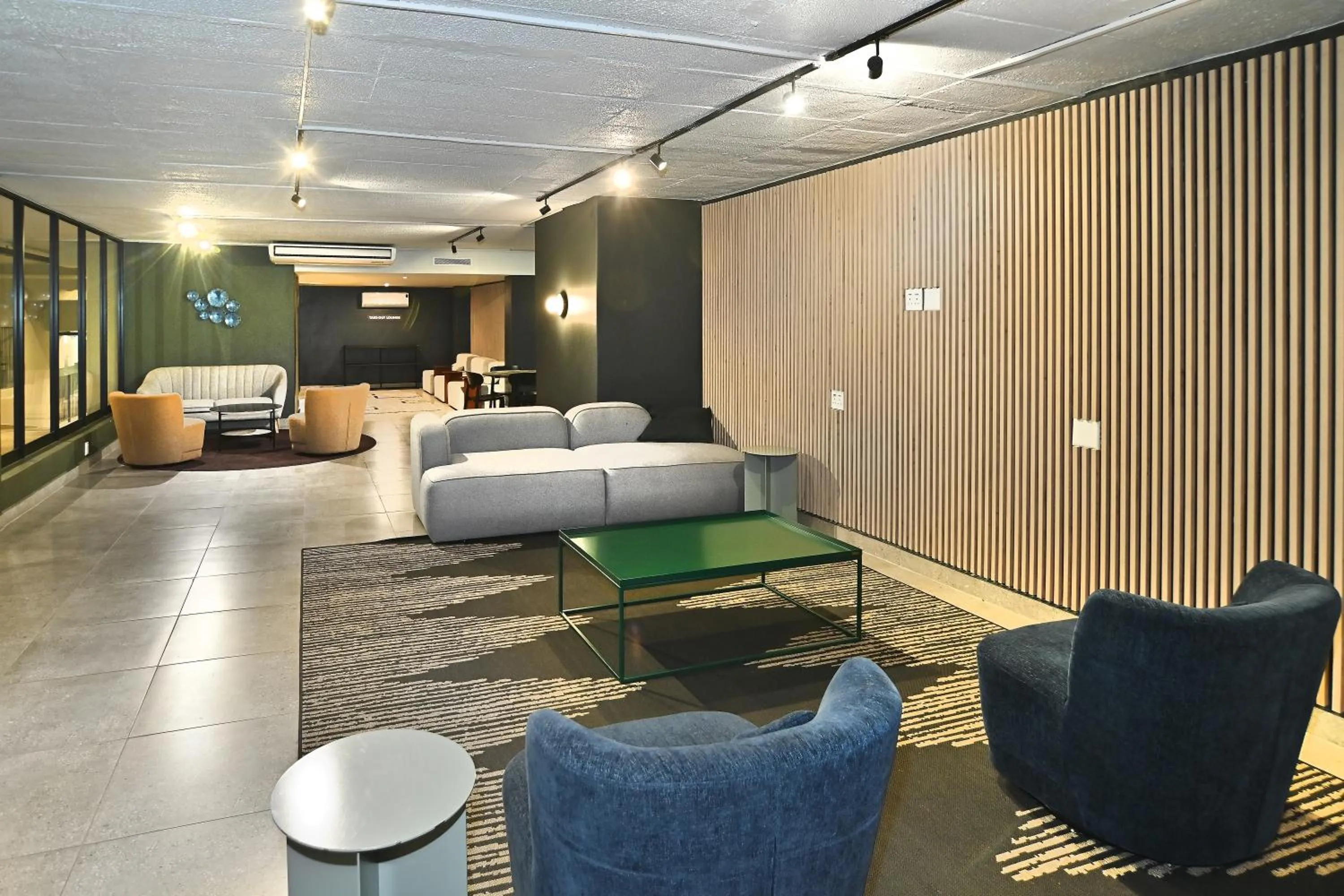 Seating area in Circa Aparthotel by Totalstay