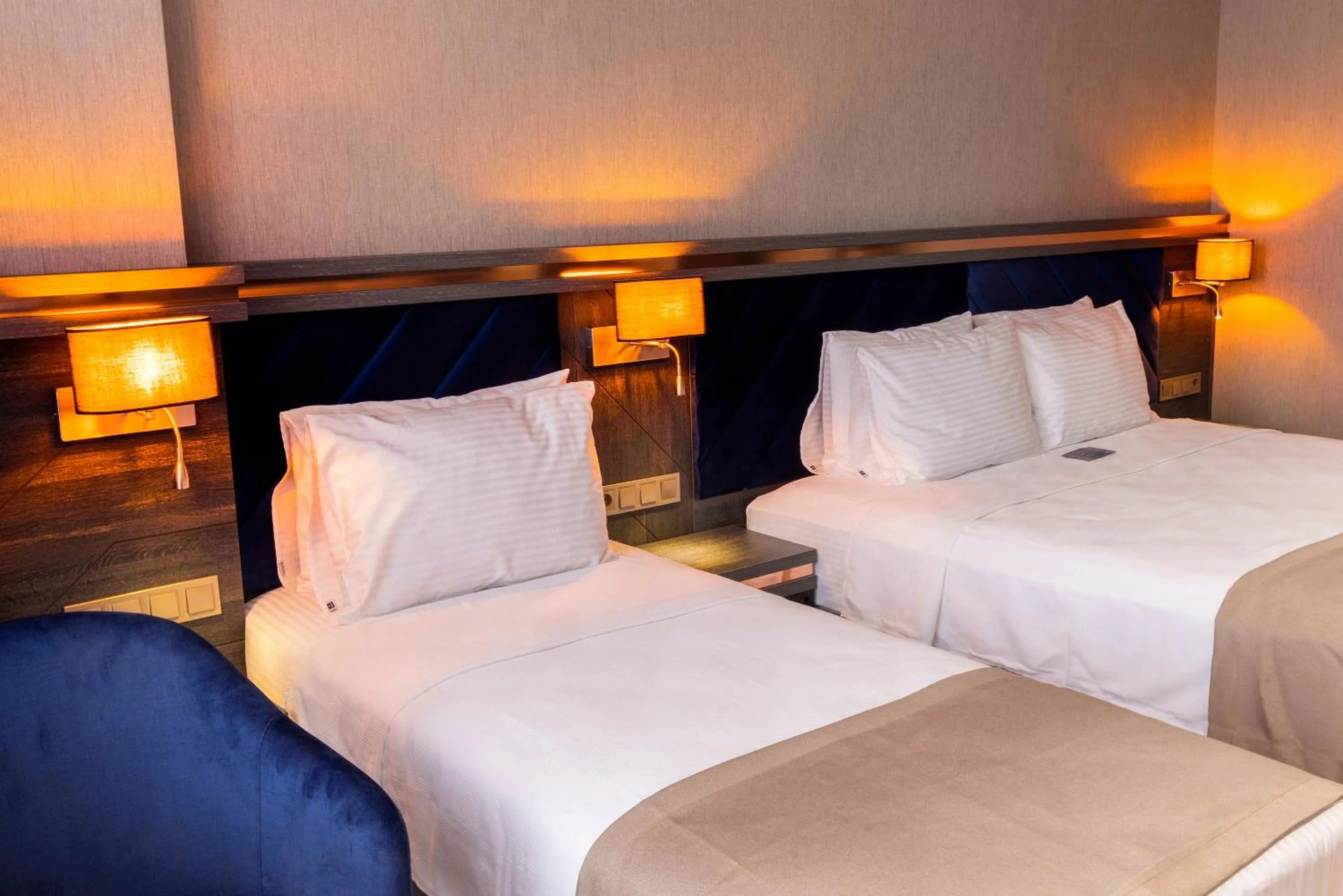 Bed in WestDoor Hotel