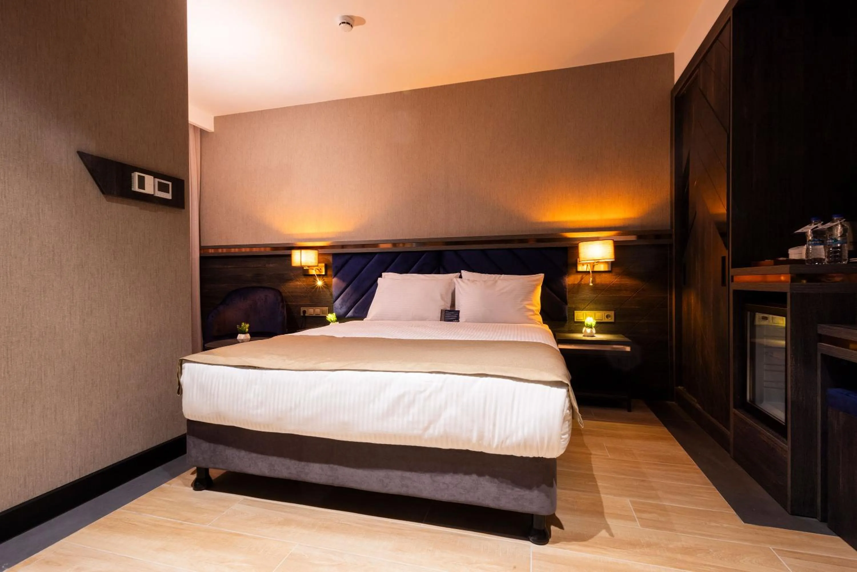 Bed in WestDoor Hotel