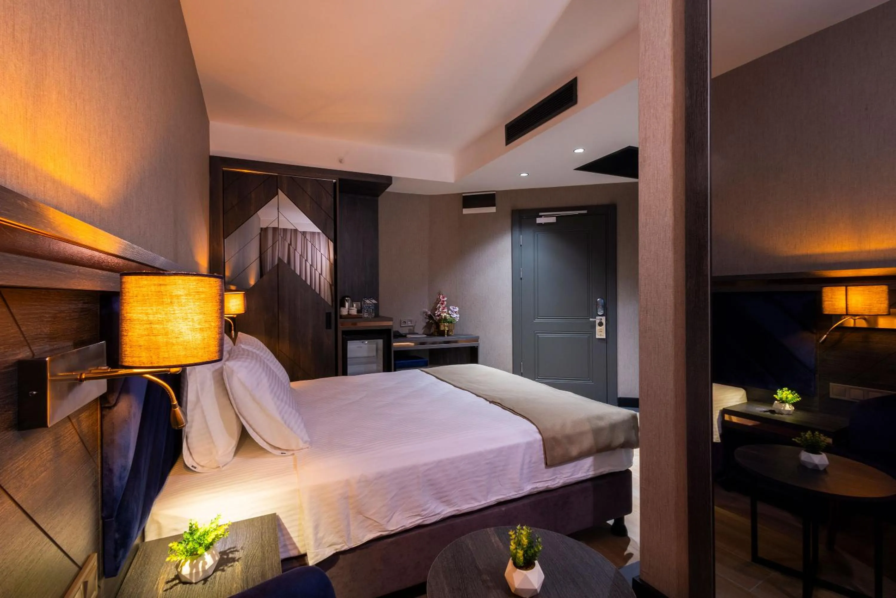 Bed in WestDoor Hotel