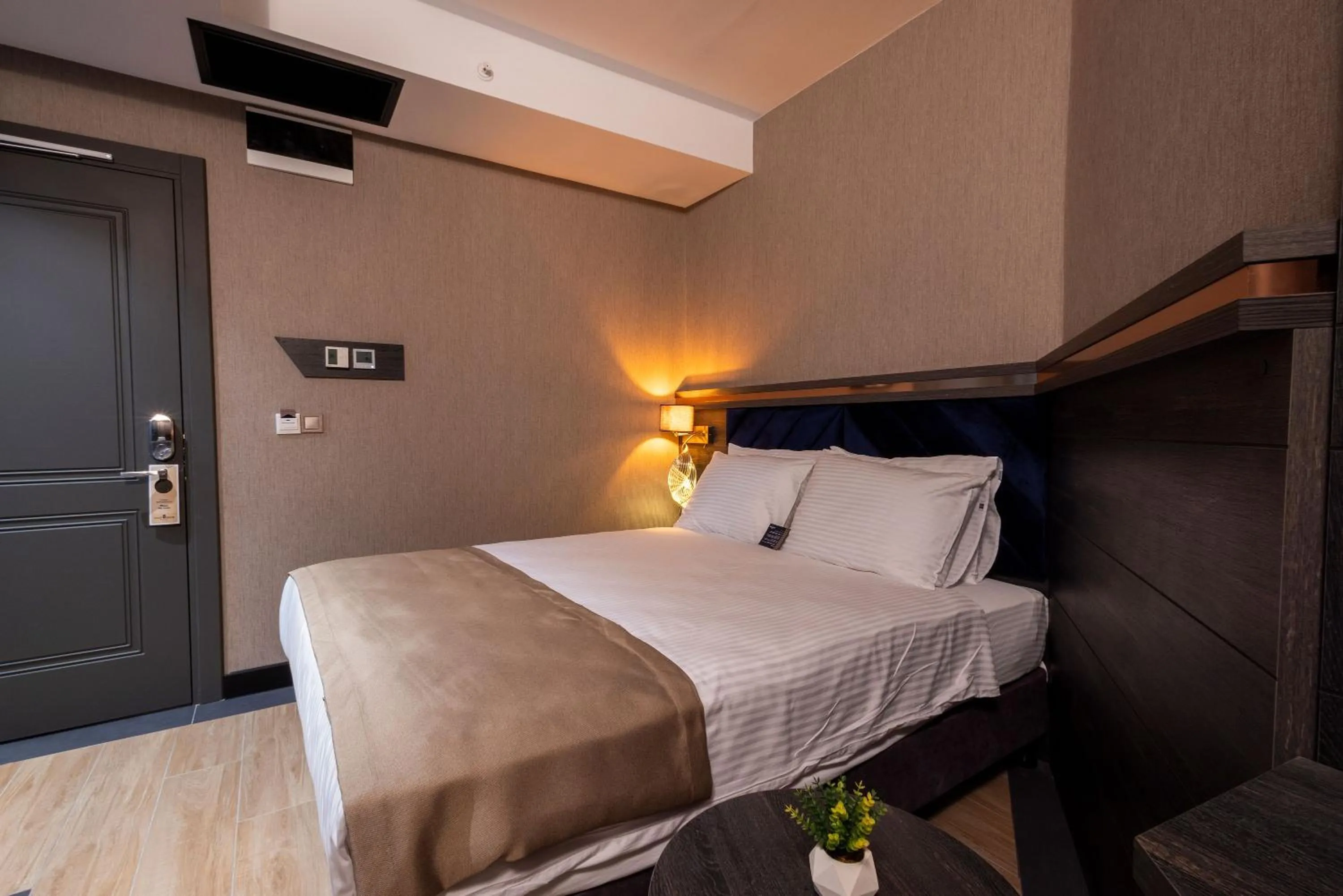 Bed in WestDoor Hotel