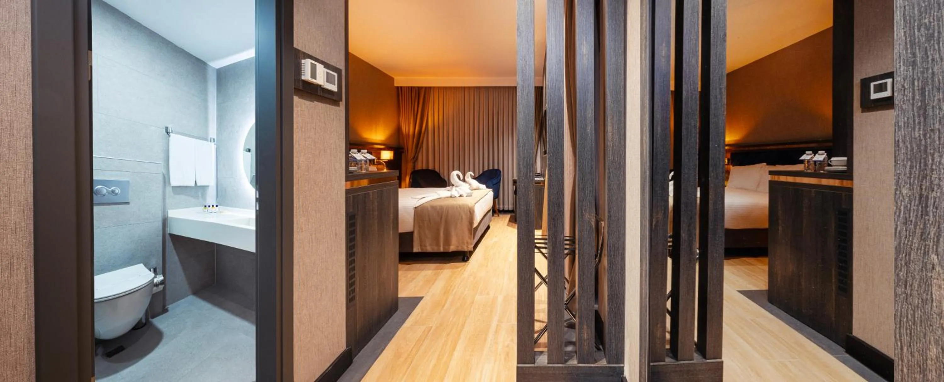 Toilet, Bed in WestDoor Hotel