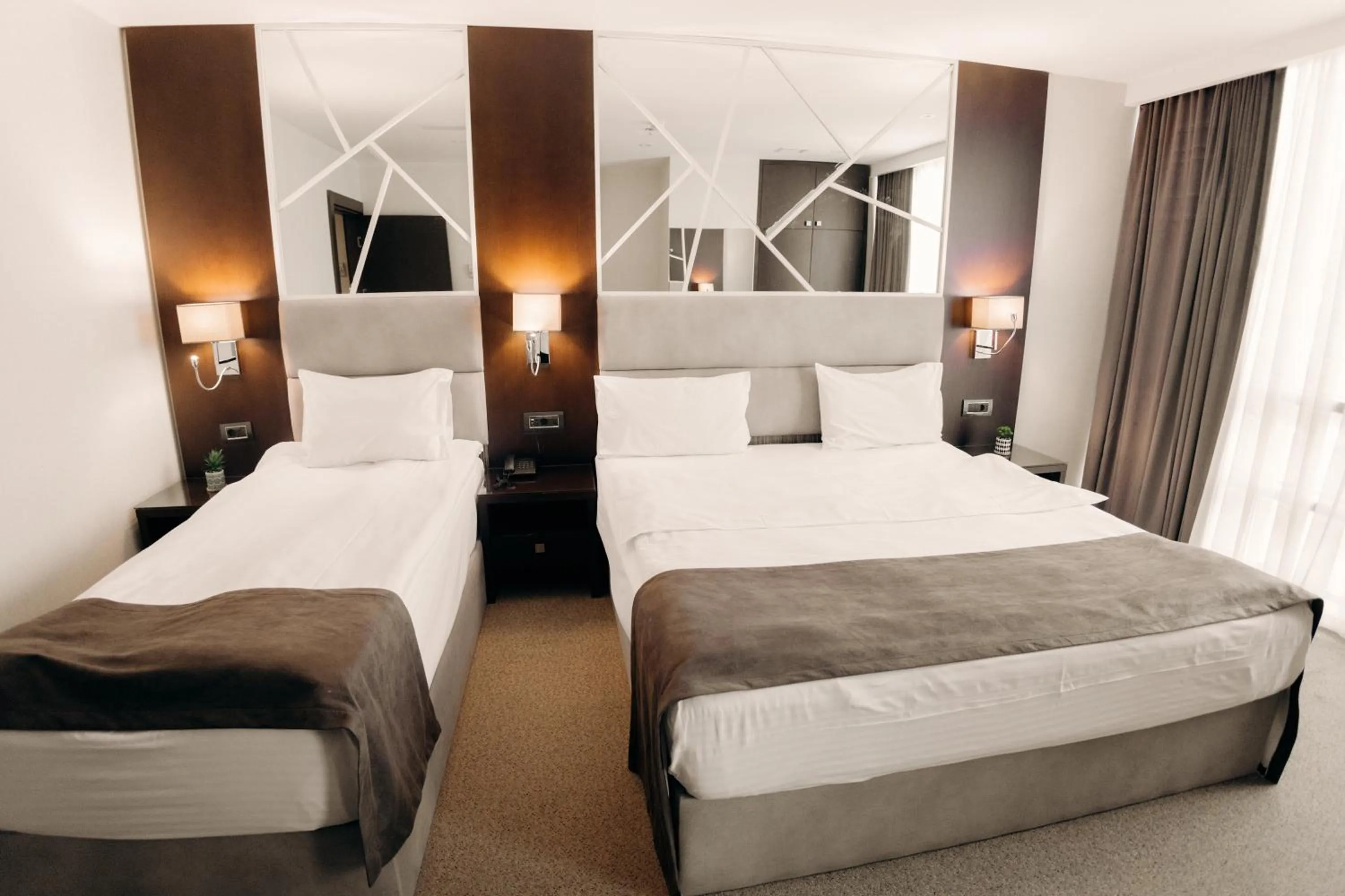 Bed in The Diamond Hotel Baku