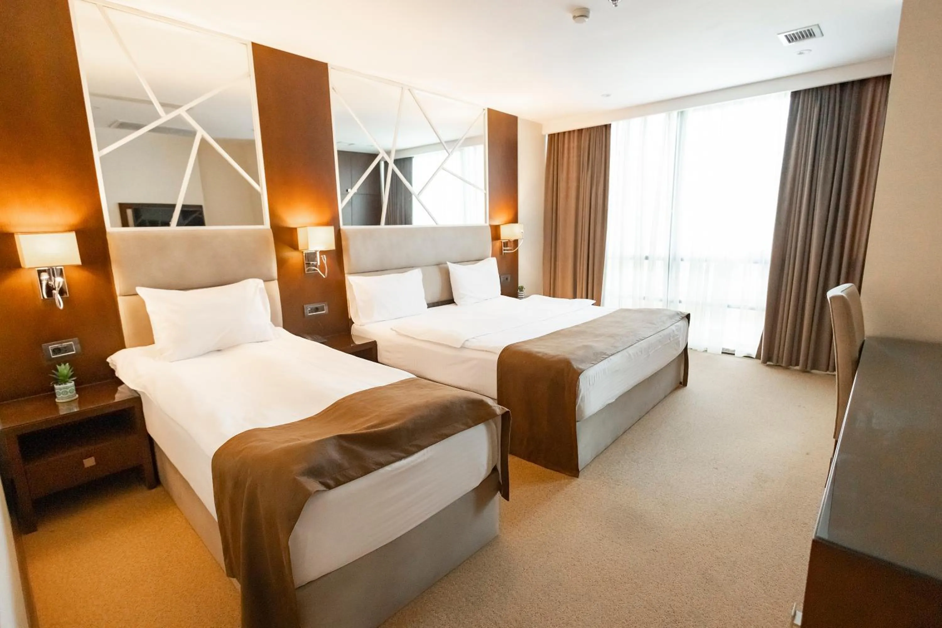 Bed in The Diamond Hotel Baku