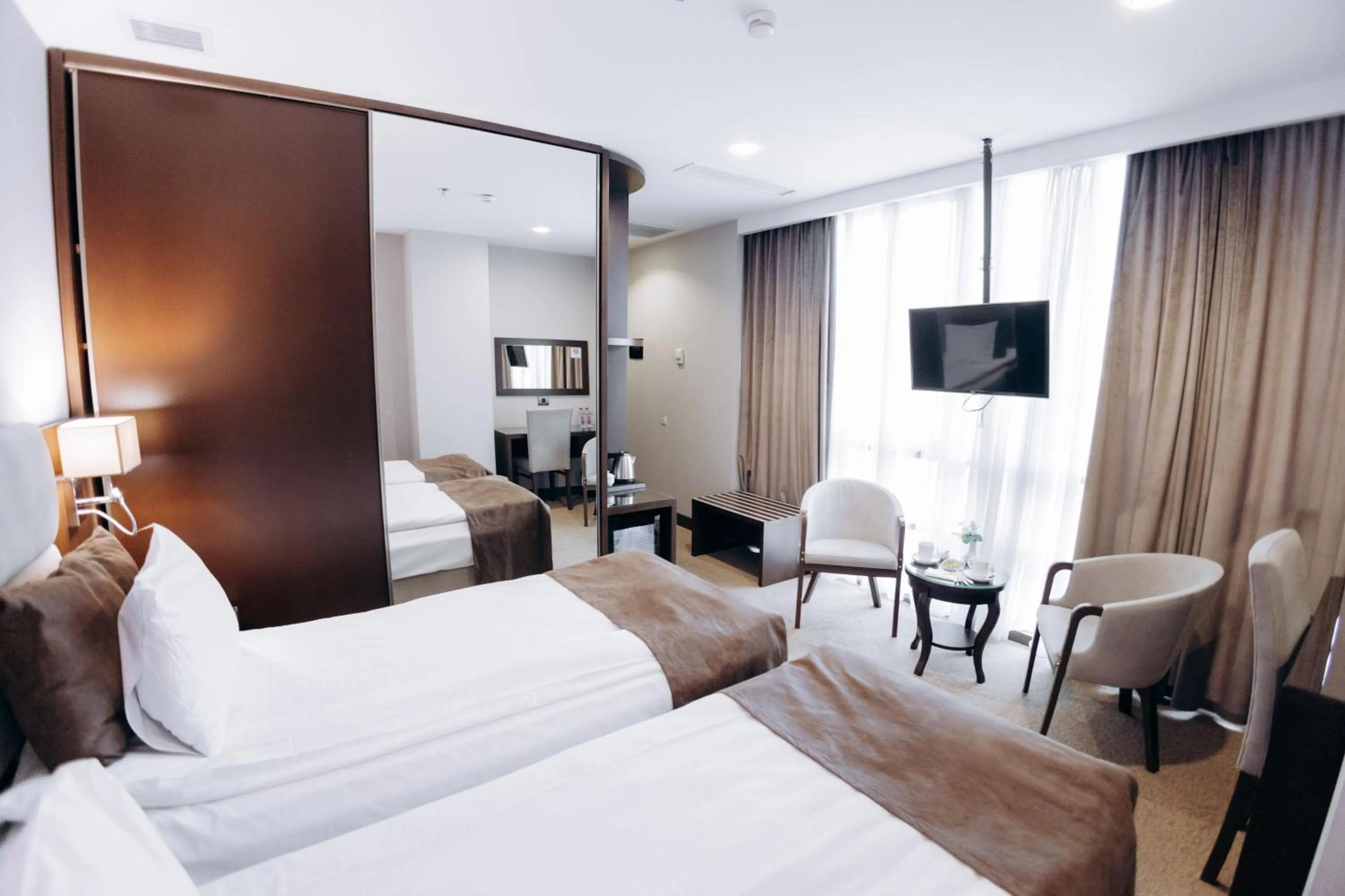 Communal lounge/ TV room in The Diamond Hotel Baku