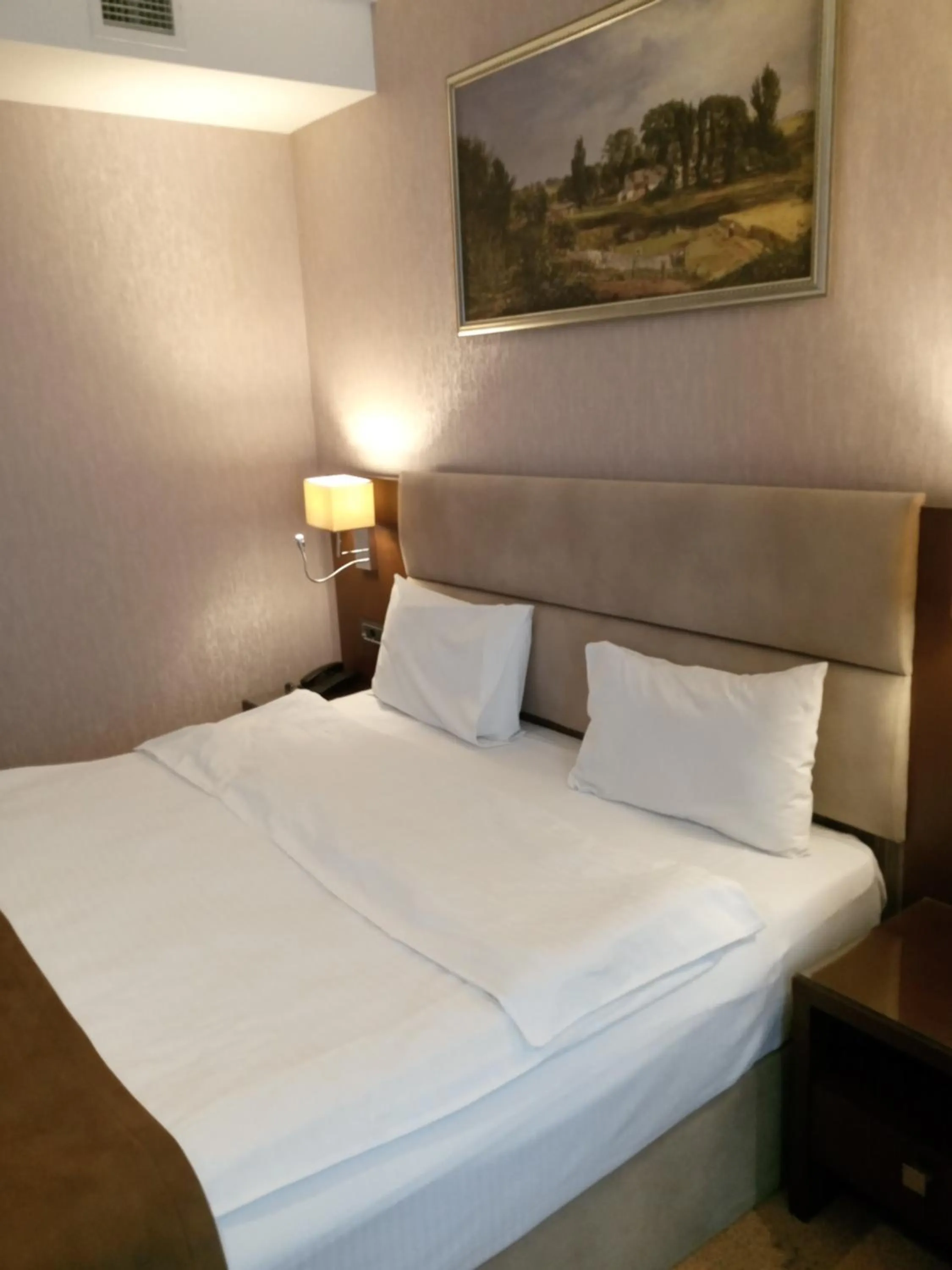 Bed in The Diamond Hotel Baku