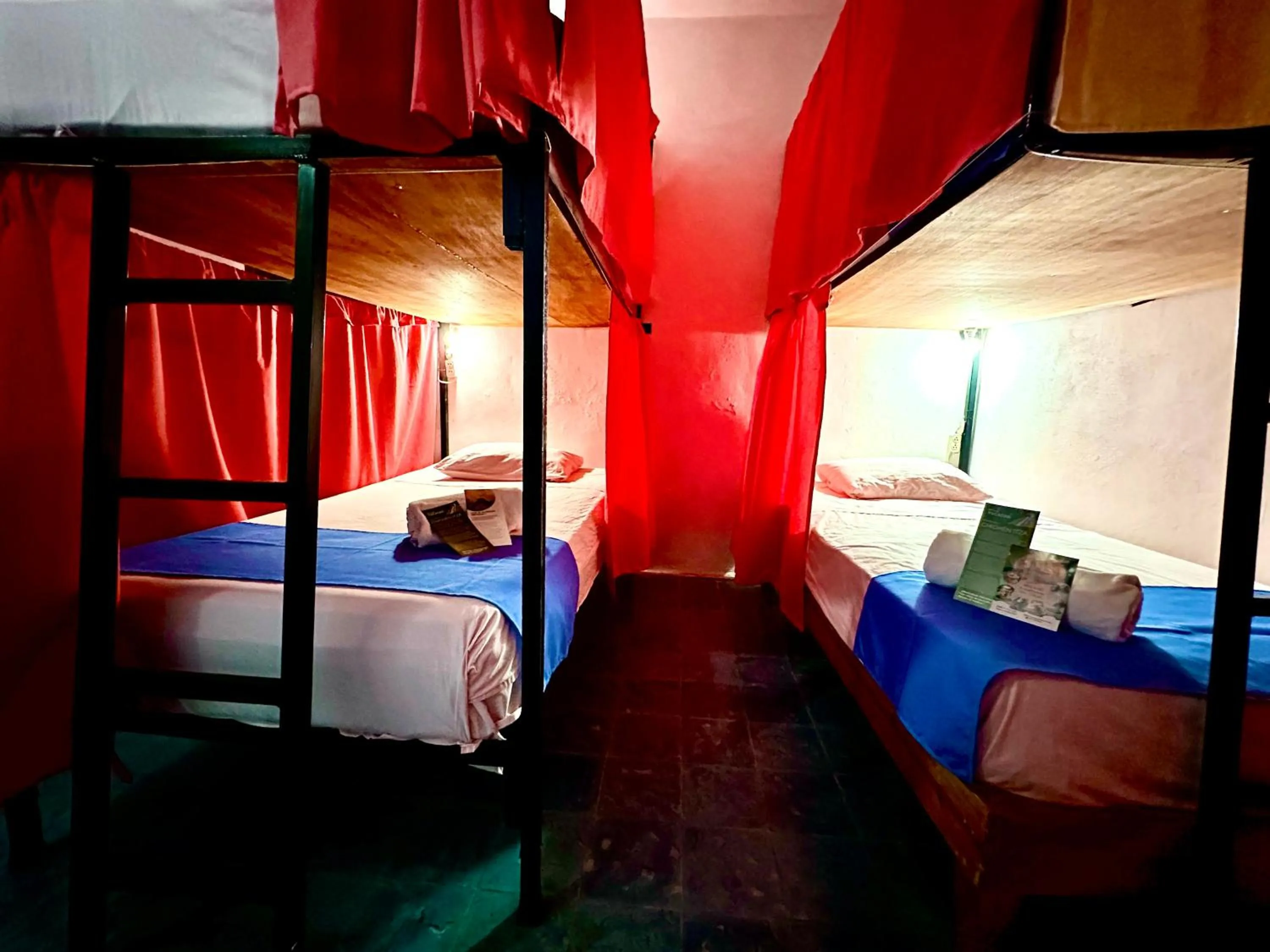 Bed in Guacamayas Hostel and Social Laundry
