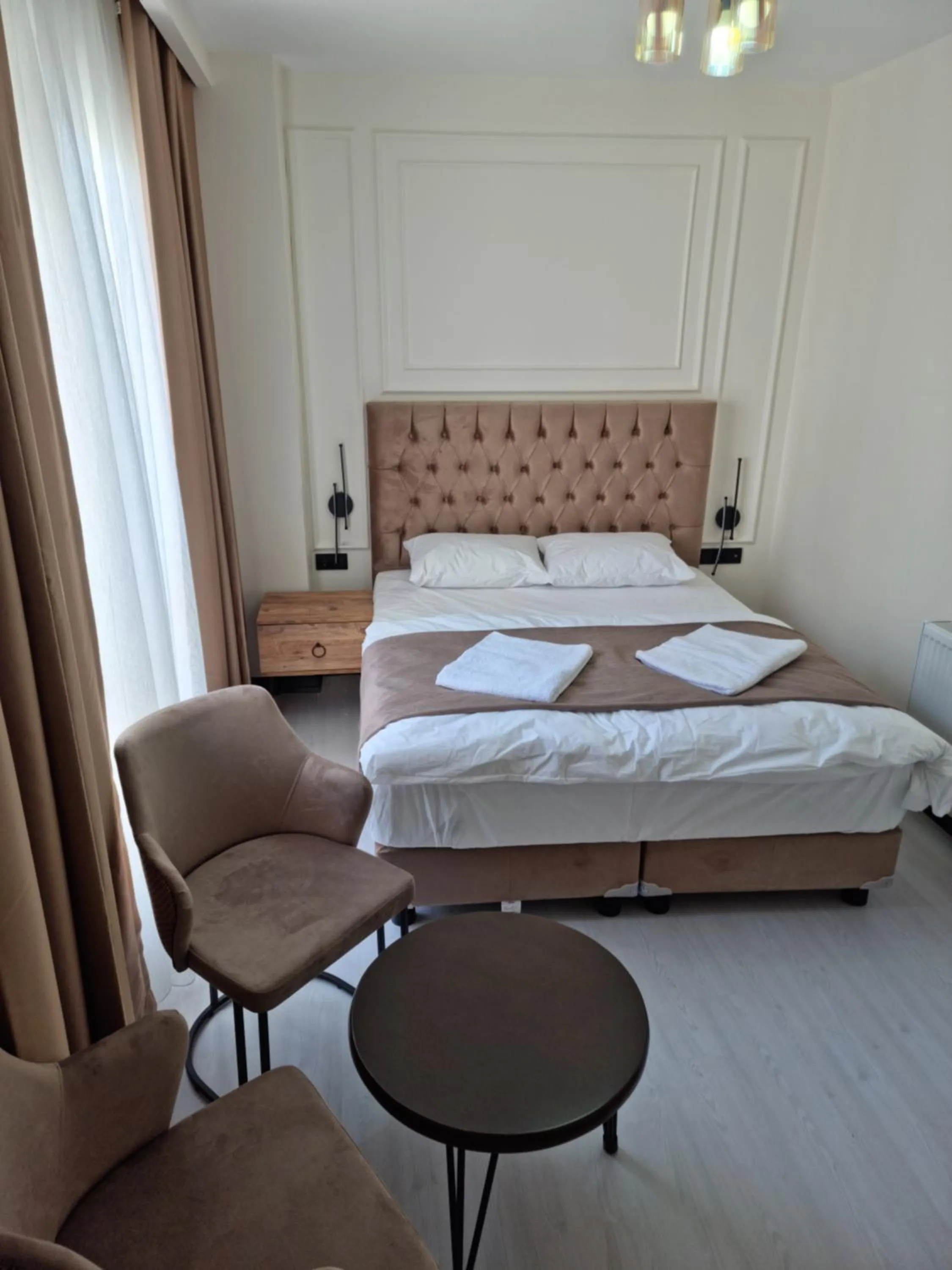 Bed in Elite Park Hotel & Suites