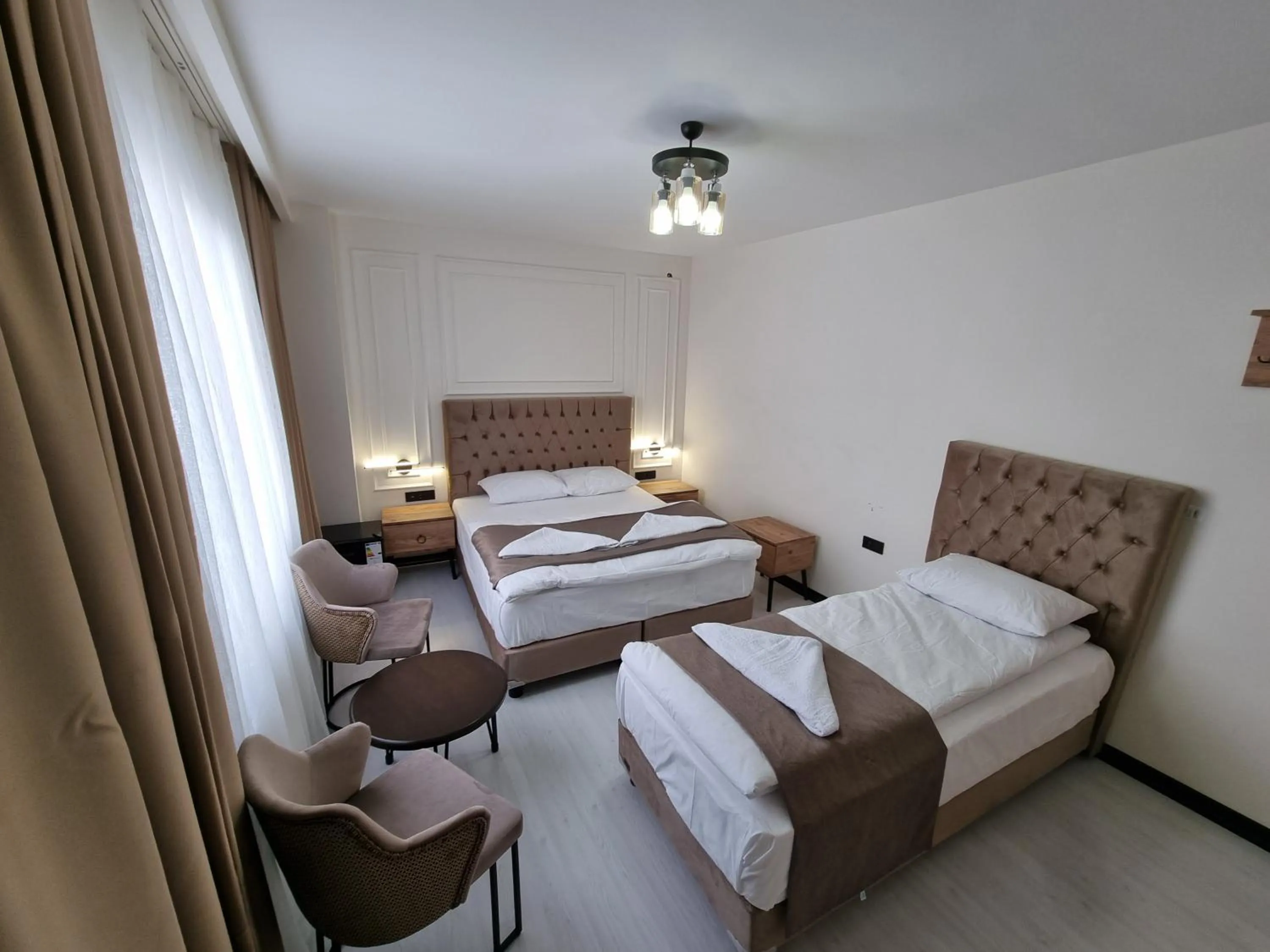 Bed in Elite Park Hotel & Suites