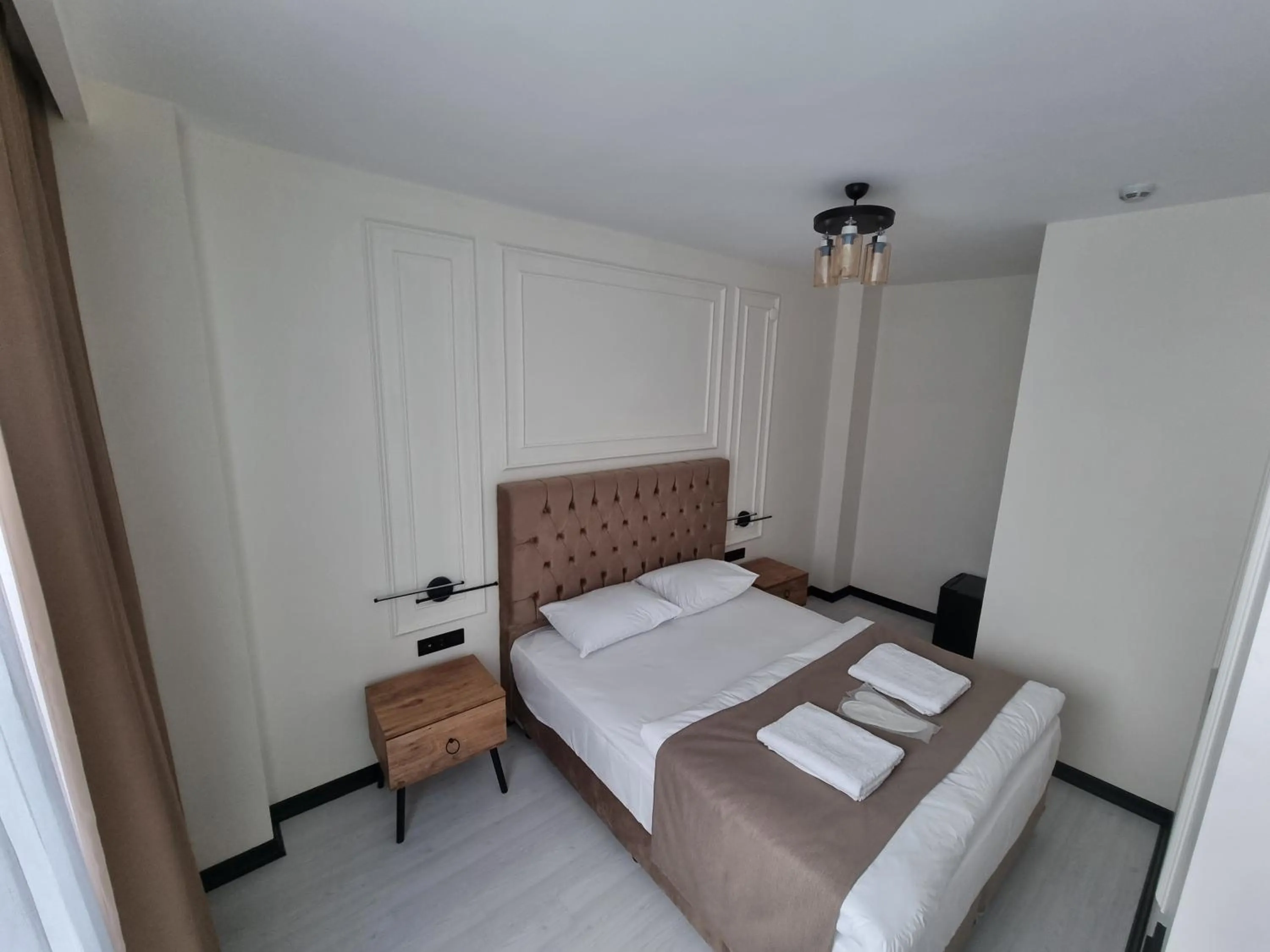 Bed in Elite Park Hotel & Suites