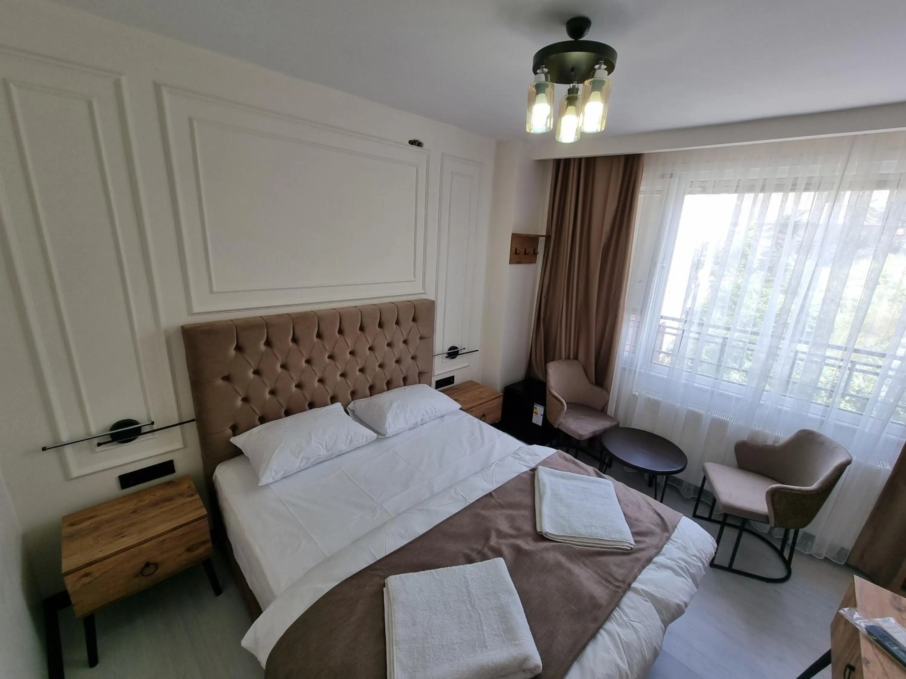 Bed in Elite Park Hotel & Suites