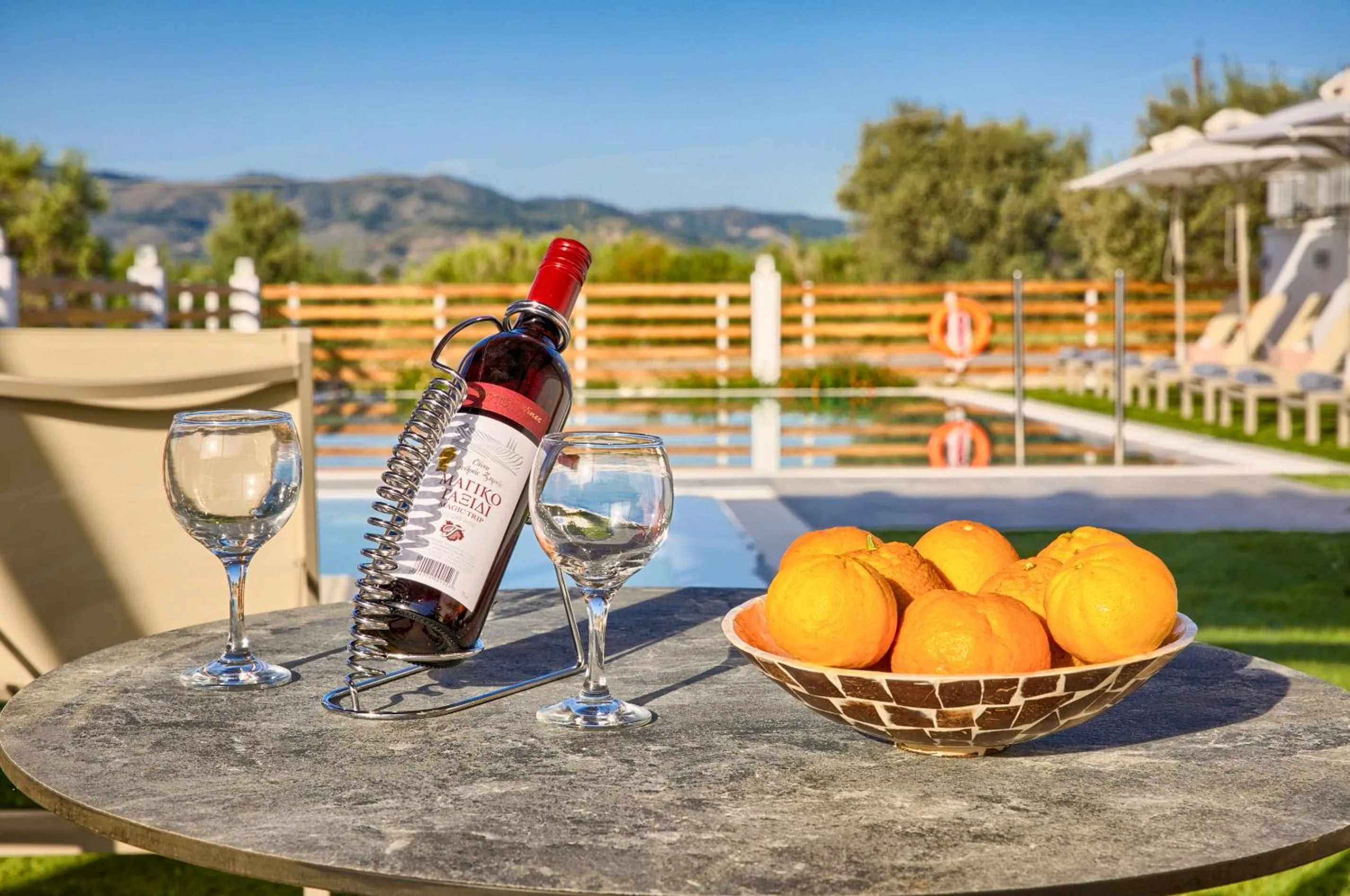 Swimming pool in KOUROS STONE SUITES