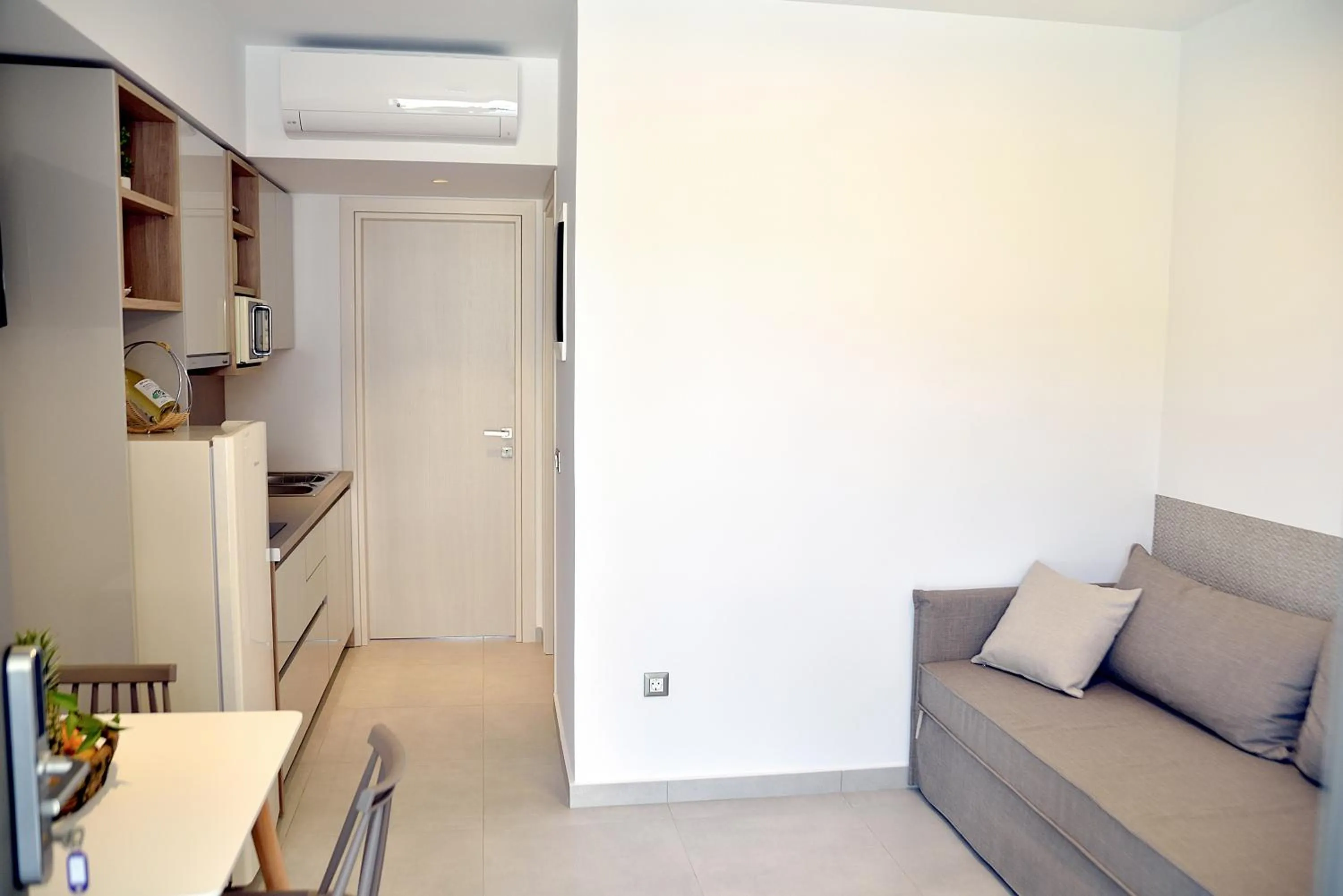 Kitchen or kitchenette in KOUROS STONE SUITES