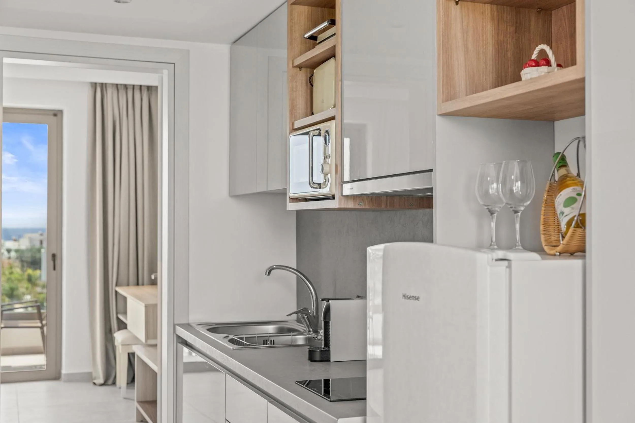 Kitchen or kitchenette in KOUROS STONE SUITES