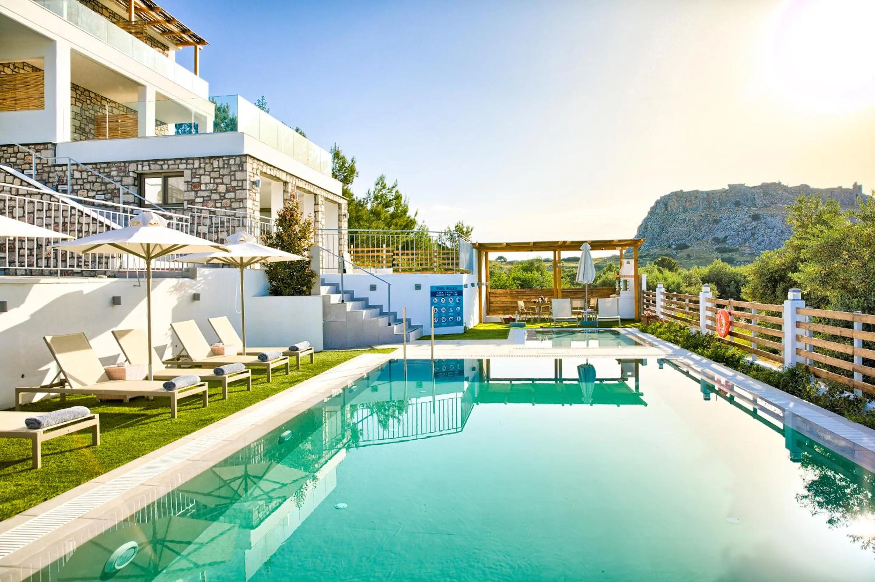 Swimming pool in KOUROS STONE SUITES
