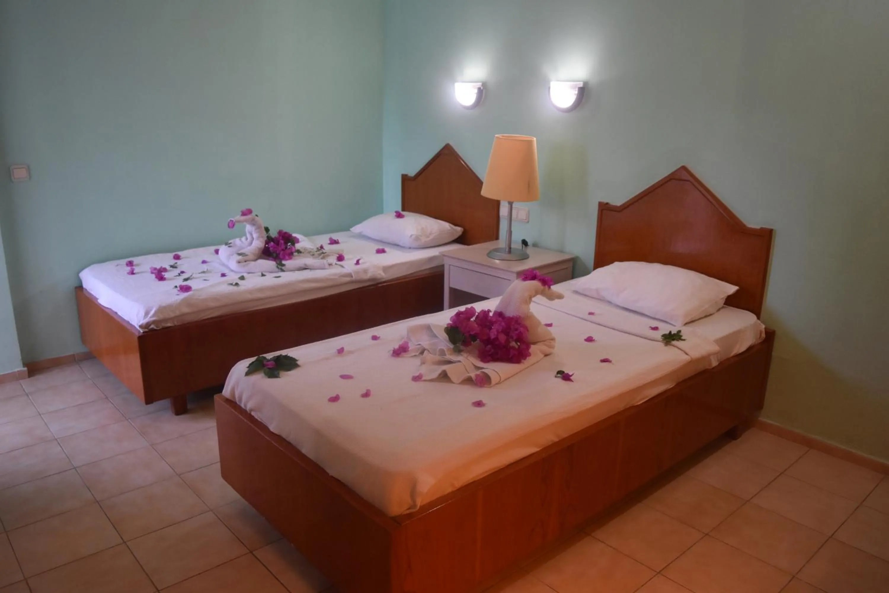 Bed in Ares City Hotel