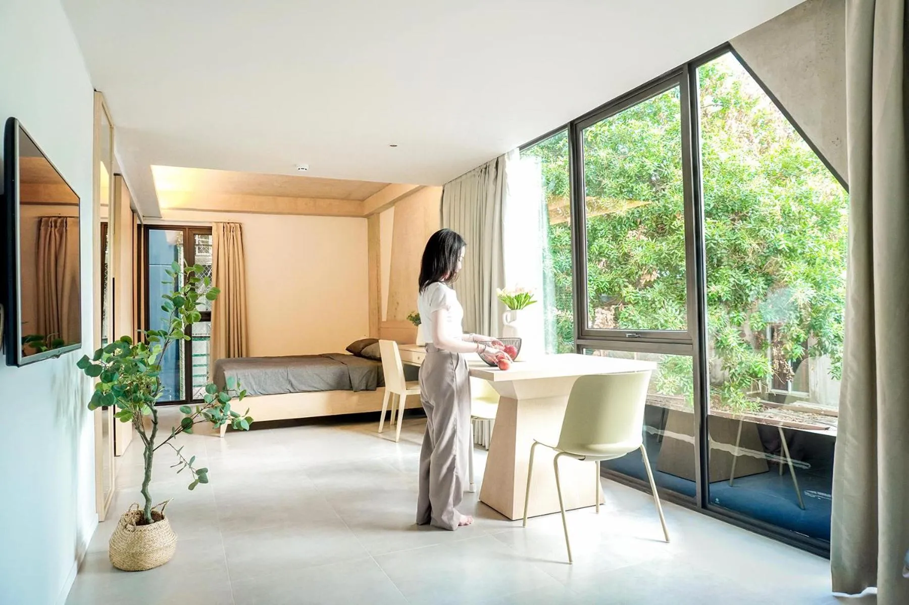 Photo of the whole room in Express by M Village Nguyễn Văn Thủ