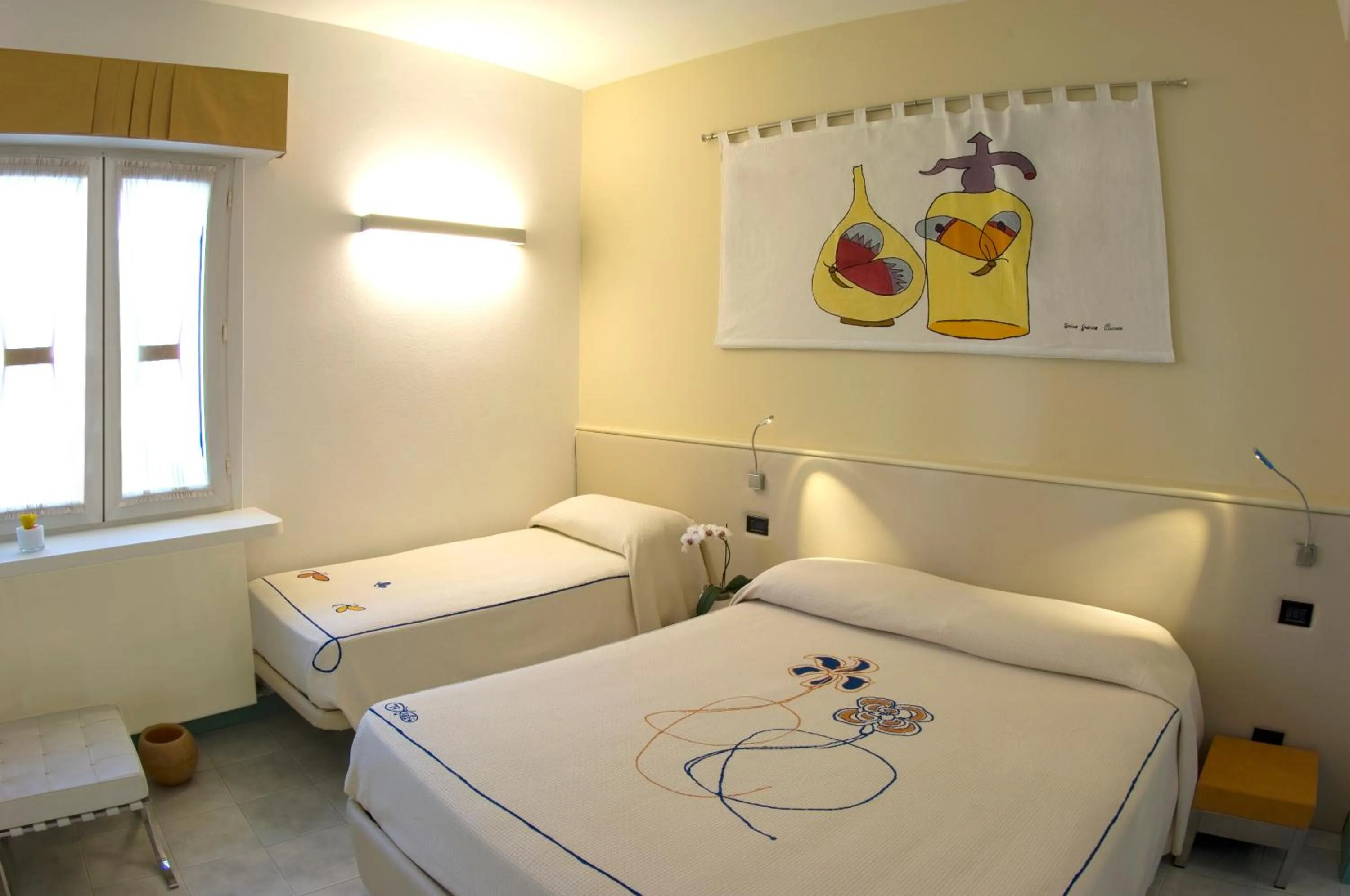 Bed in Hotel Eros Residence