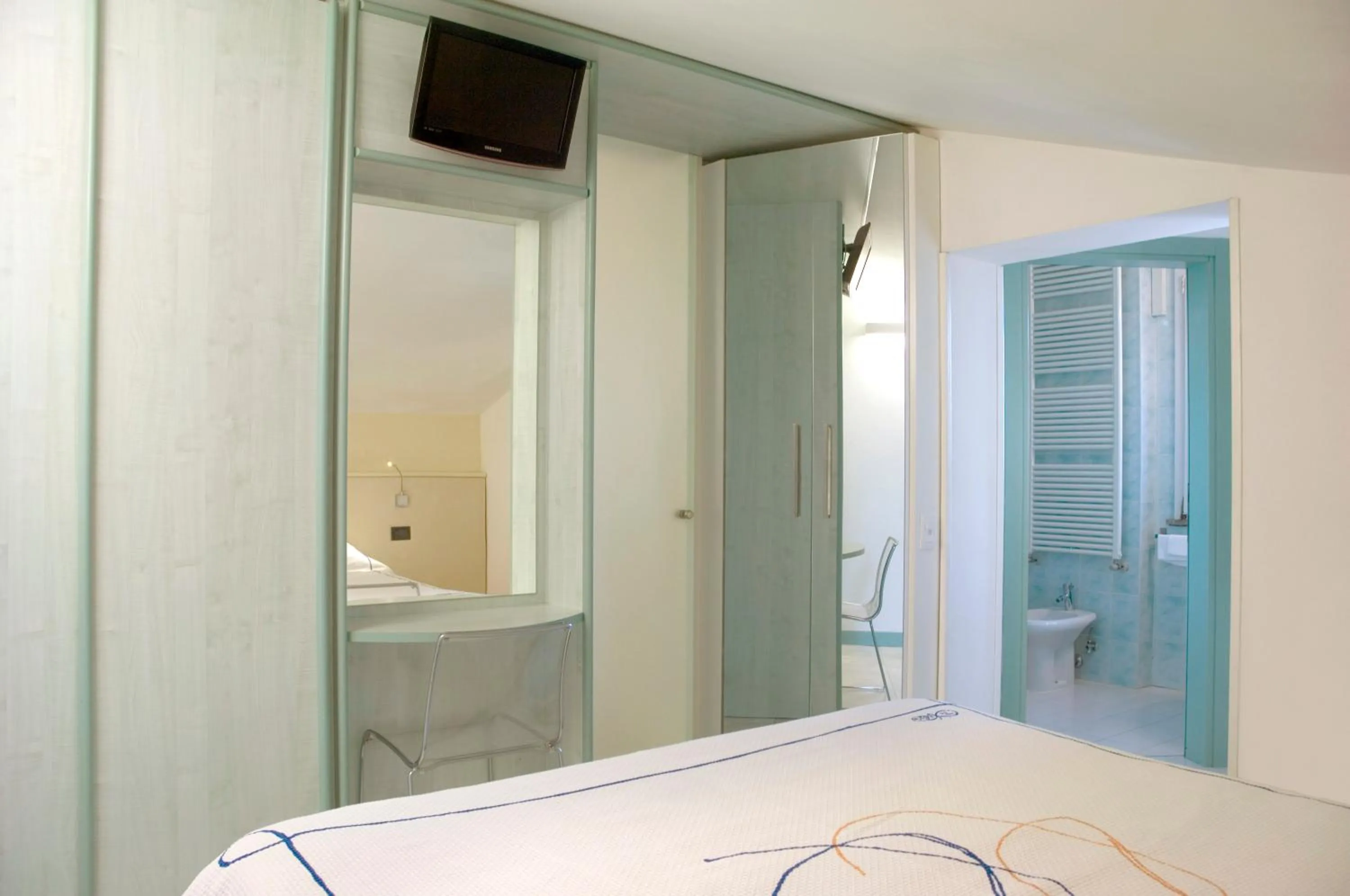 Bed in Hotel Eros Residence