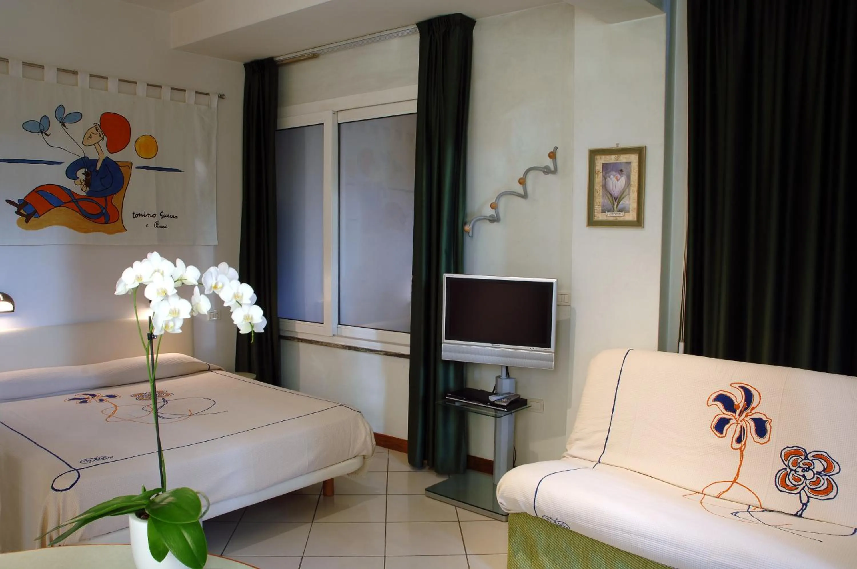 Bed in Hotel Eros Residence