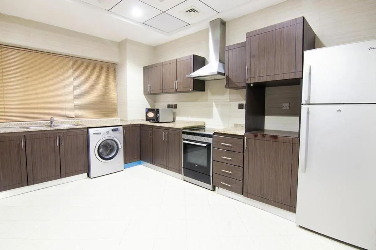 Kitchen or kitchenette in Better Living Apartment