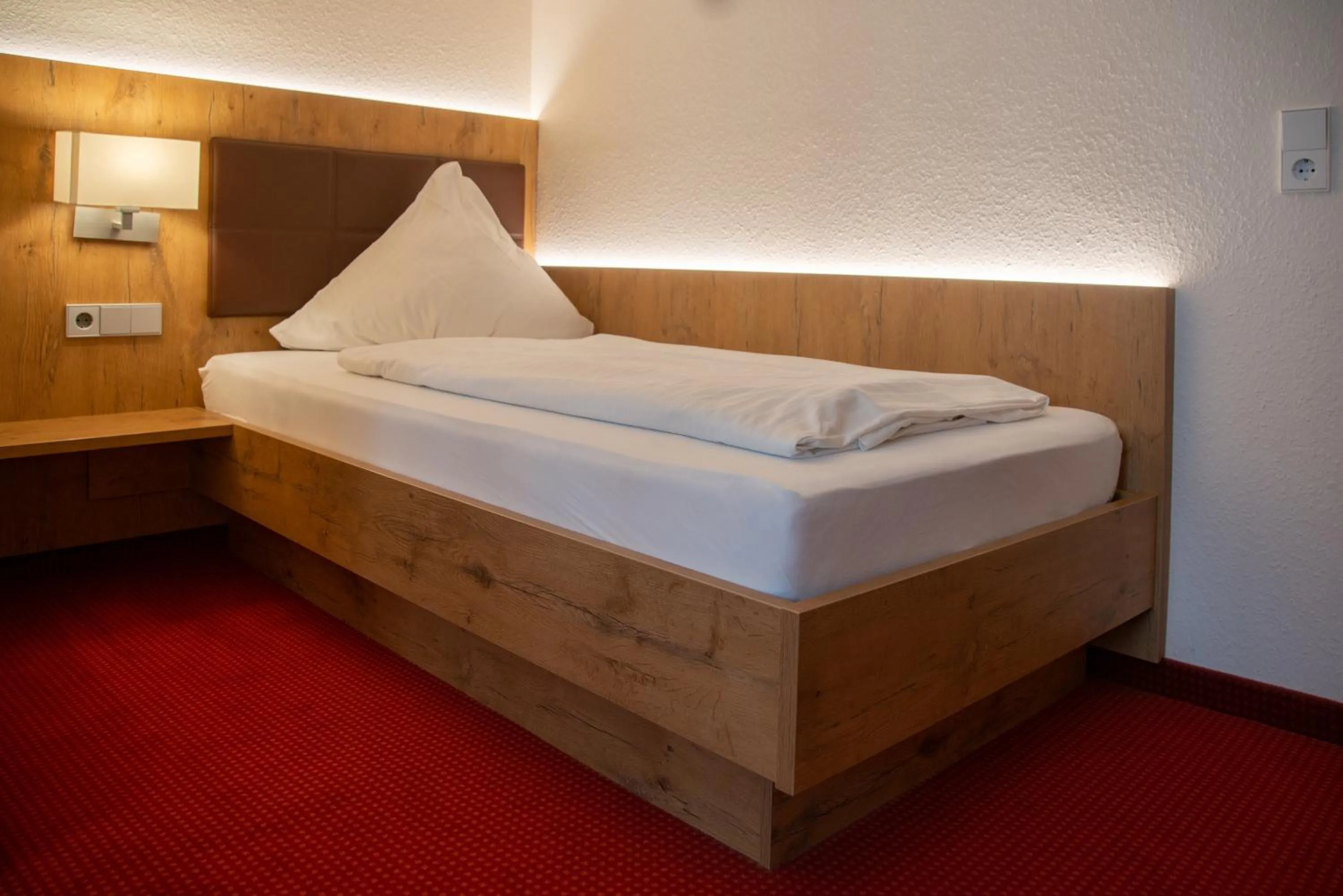 Bed in Hotel Restaurant Schwarzer Adler