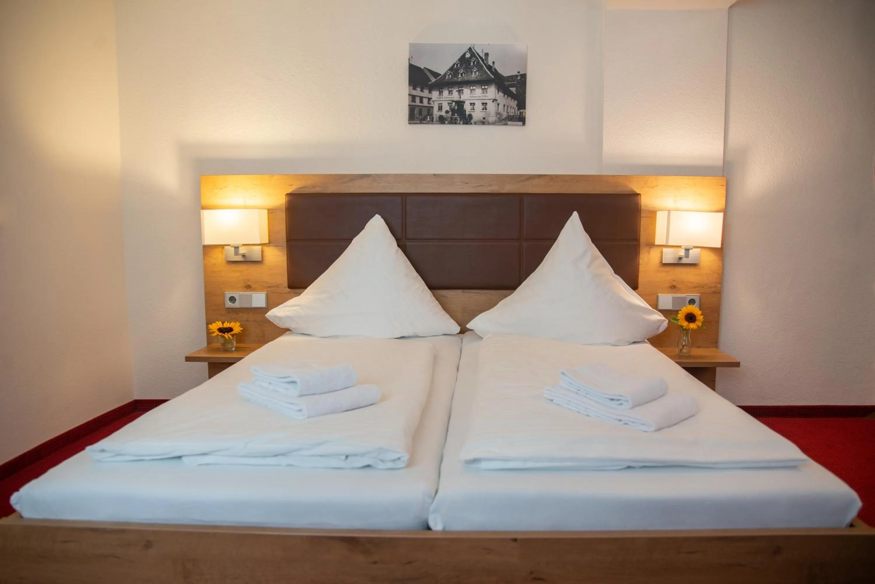 Bed in Hotel Restaurant Schwarzer Adler