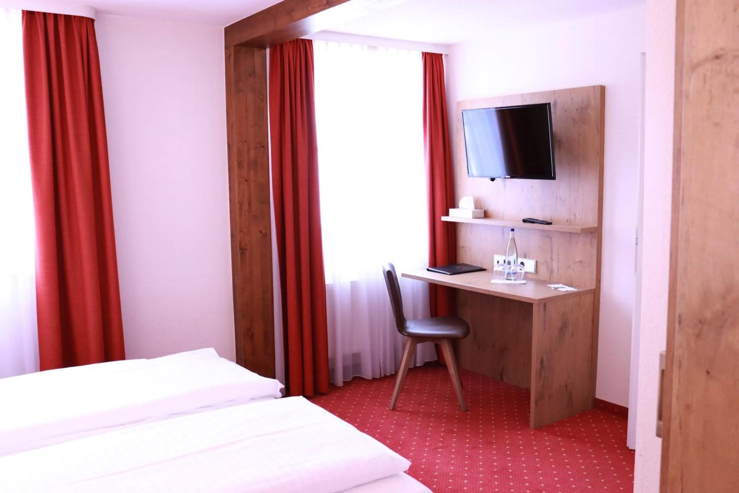 Bed in Hotel Restaurant Schwarzer Adler